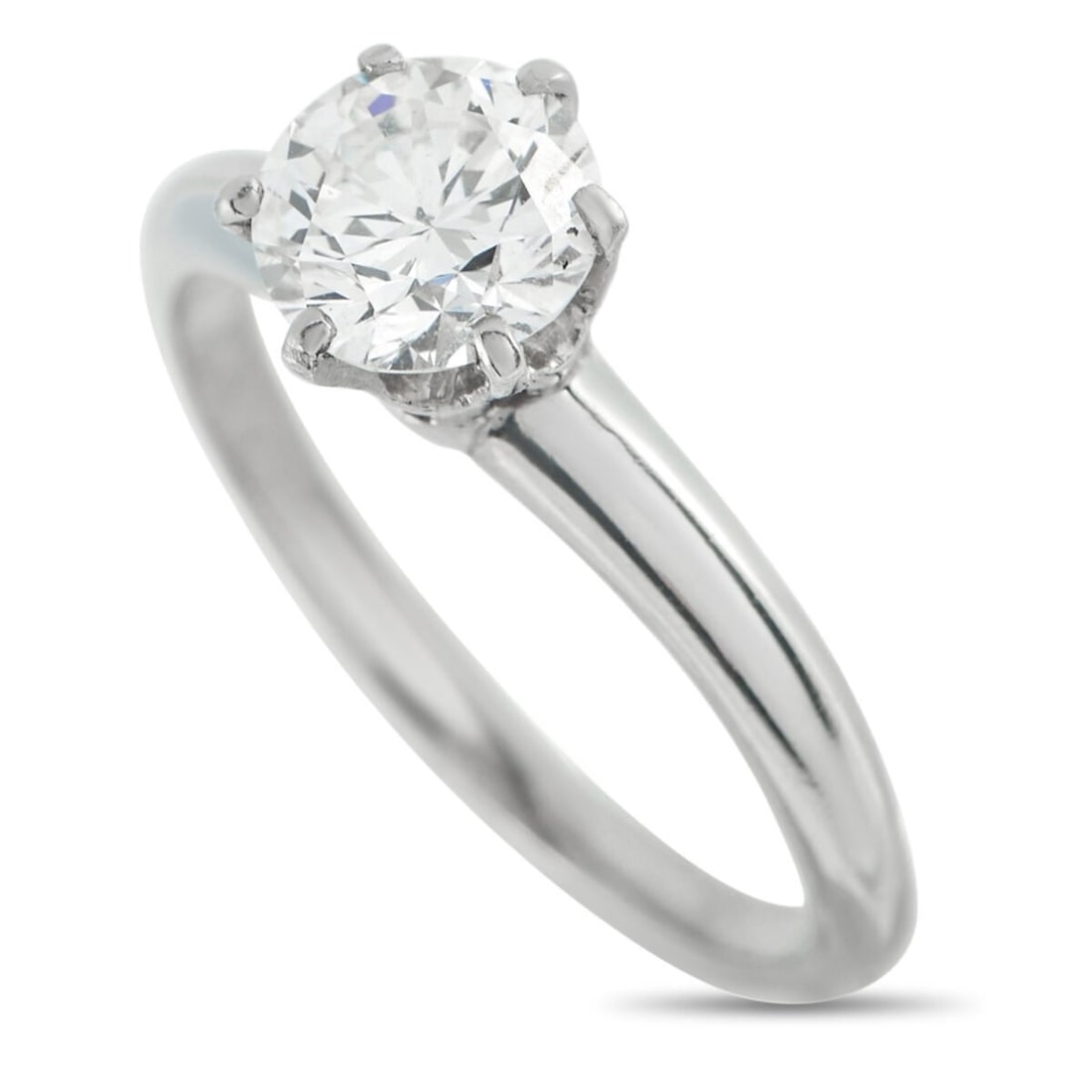 Tiffany & Co. - Ring Tiffany & Co. Platinum 0.65ct Diamond Solitaire Ring , Platinum - 0.65ct. tw.: Tiffany & Co. Platinum 0.65ct Diamond Solitaire Ring This Tiffany & Co. solitaire ring is ideal for anyone with a minimalist aesthetic. The sleek Platinum setting showcases this piece’s sparkling 0.