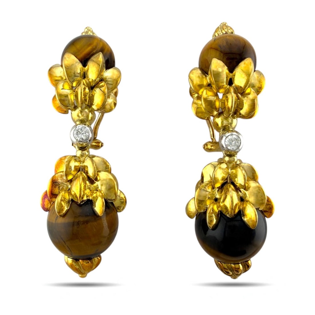 14 kt. Yellow gold, Exclusive 14K Yellow Gold Carved Wood and 0.28ct Diamond 0.28ct. tw. Diamond: Exclusive 14K Yellow Gold Carved Wood and 0.28ct Diamond EarringsA striking antique pair of 14K yellow gold earrings featuring polished carved wooden spheres, artistically suspended within sculpted go