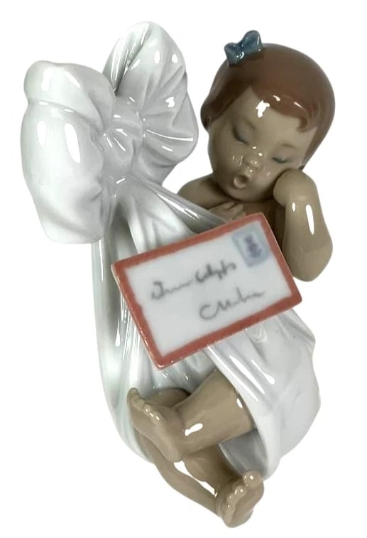 LLADRO HEAVENS GIFT (GIRL) 1999-01 PORCELAIN FIGURINE 6626G: LLADRO HEAVENS GIFT (GIRL) 1999-01 PORCELAIN FIGURINE 6626GHeight (in): 4.75 Width (in): 4.75The LLADRO HEAVENS GIFT (GIRL) 1999-01 Porcelain Figurine is a large, handcrafted collectible from the late