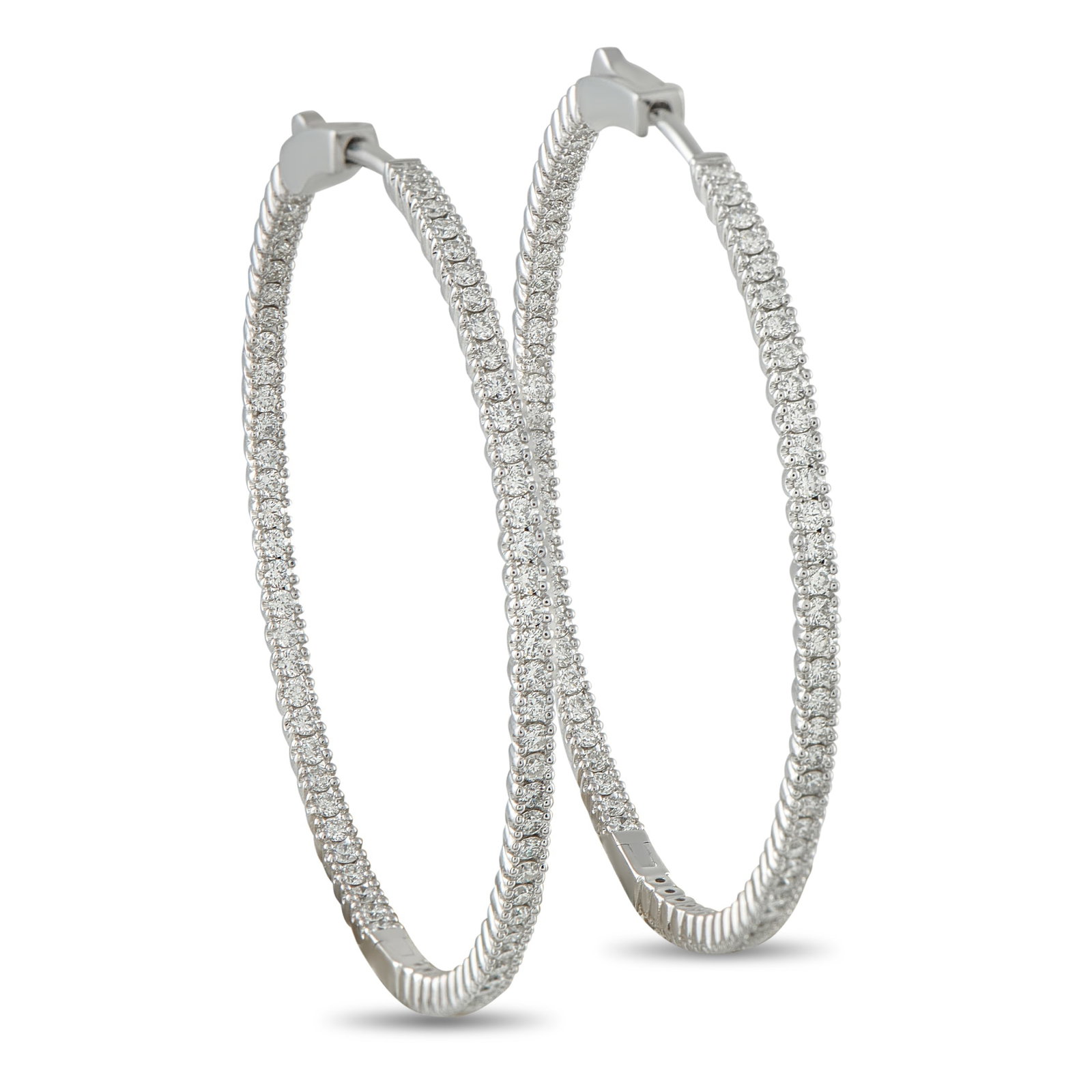 14K White Gold 1.56ct Diamond Inside-Out Hoop Earrings: Add a touch of sophistication to any outfit with these elegant hoop earrings. Crafted from 14K White Gold, the classic design is elevated by sparkling Diamonds totaling 1.56 carats. Each earring measu