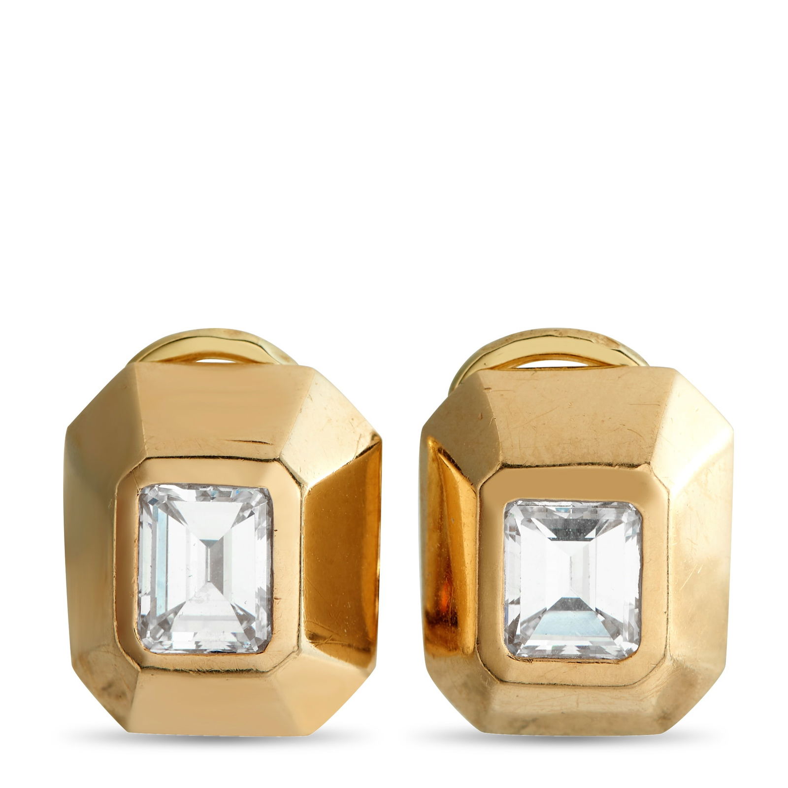 14K Yellow Gold 1.80ct Diamond Clip-on Earrings: Rendered in 14K yellow gold, these clip-on earrings are guided by precision and balance. Each earring centers on a step-cut diamond, shaped with rounded corners and set flush within a smooth bezel. An