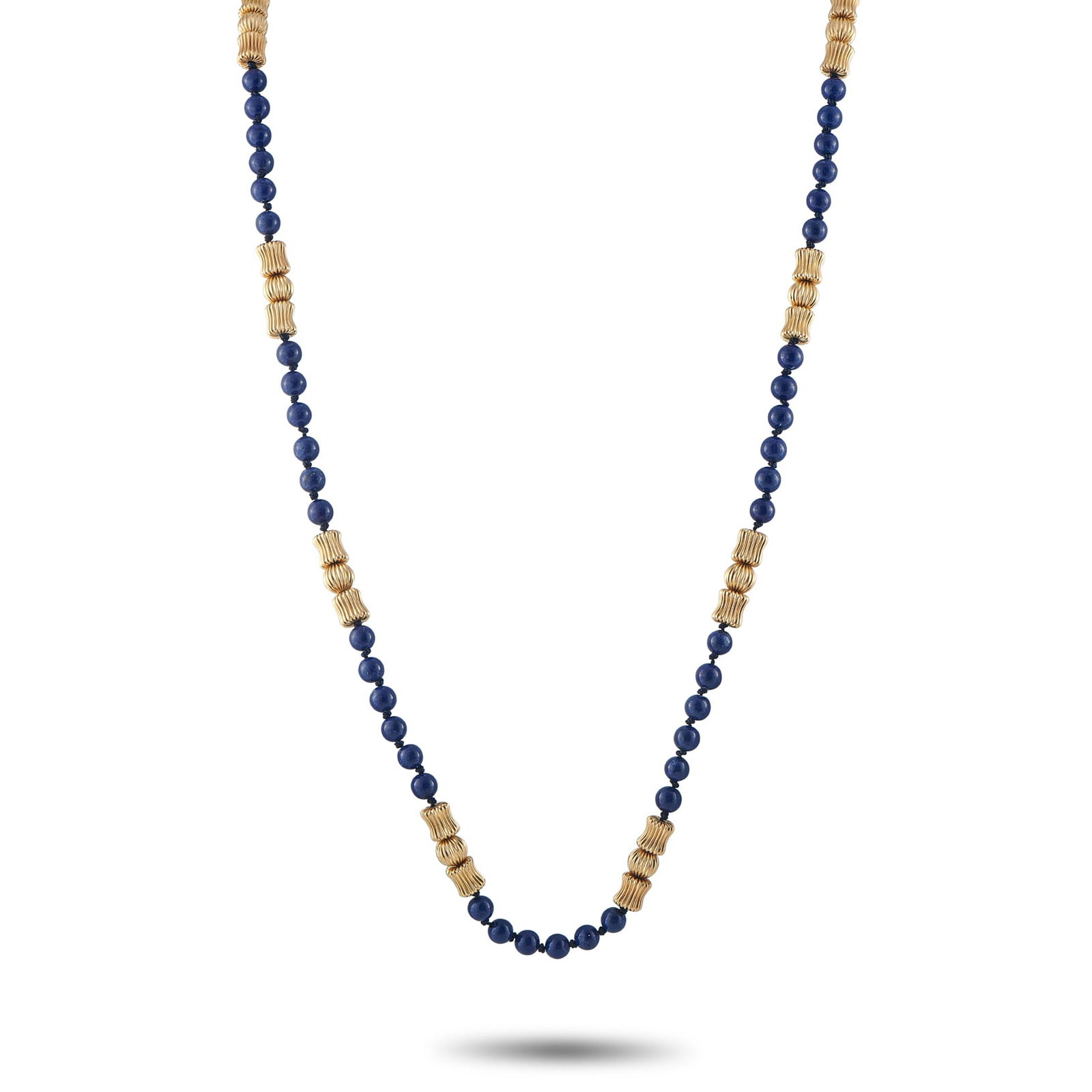 14K Yellow Gold Lapis Necklace: Lapis beads are juxtaposed with lustrous 14K Yellow Gold accents on this exquisite necklace. Bold and incredibly dramatic, it measures 27” long and will instantly add a pop of color to any