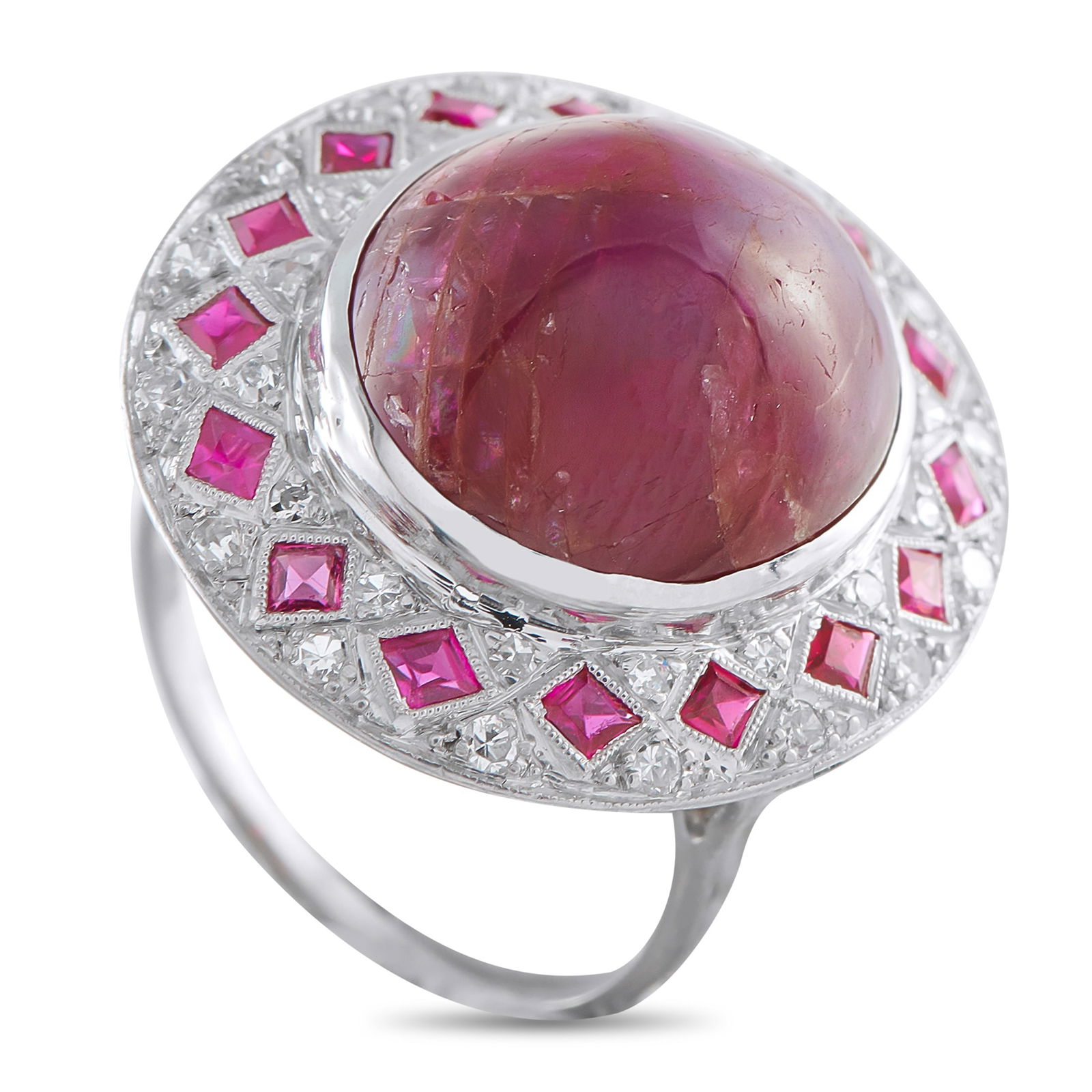 Platinum 0.34ct Diamond and Ruby Ring: This luxury ring is unique, elegant, and impossible to ignore. A Ruby cabochon makes a statement at the center, while additional Ruby gemstones elevate the striking Platinum setting – together, it