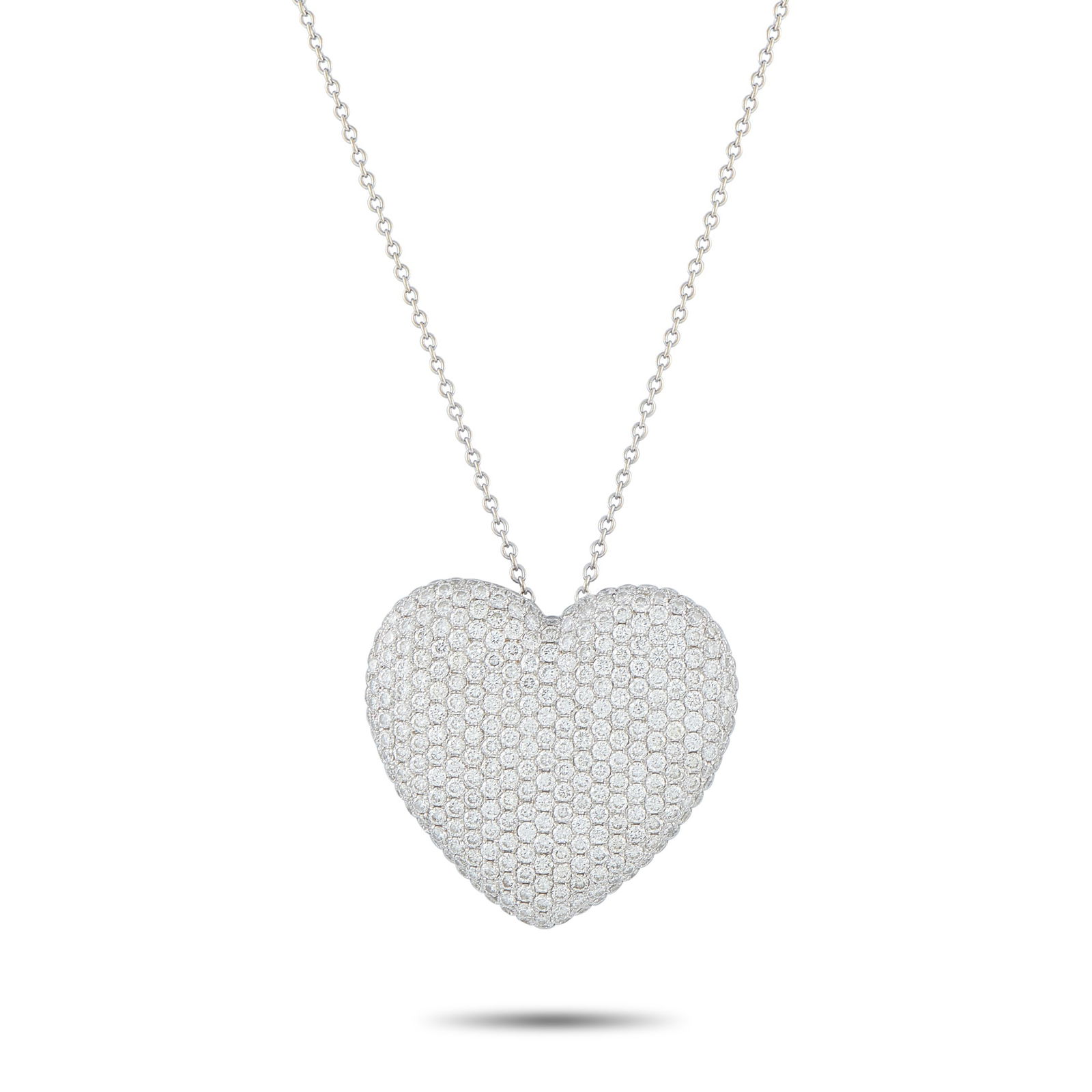 18K White Gold 3.10ct Diamond Heart Necklace: This dazzling necklace is as charming as it is elegant. Pave Diamonds with a total weight of 3.10 carats allow the heart-shaped pendant to continually catch the light. Crafted from 18K White Gold,