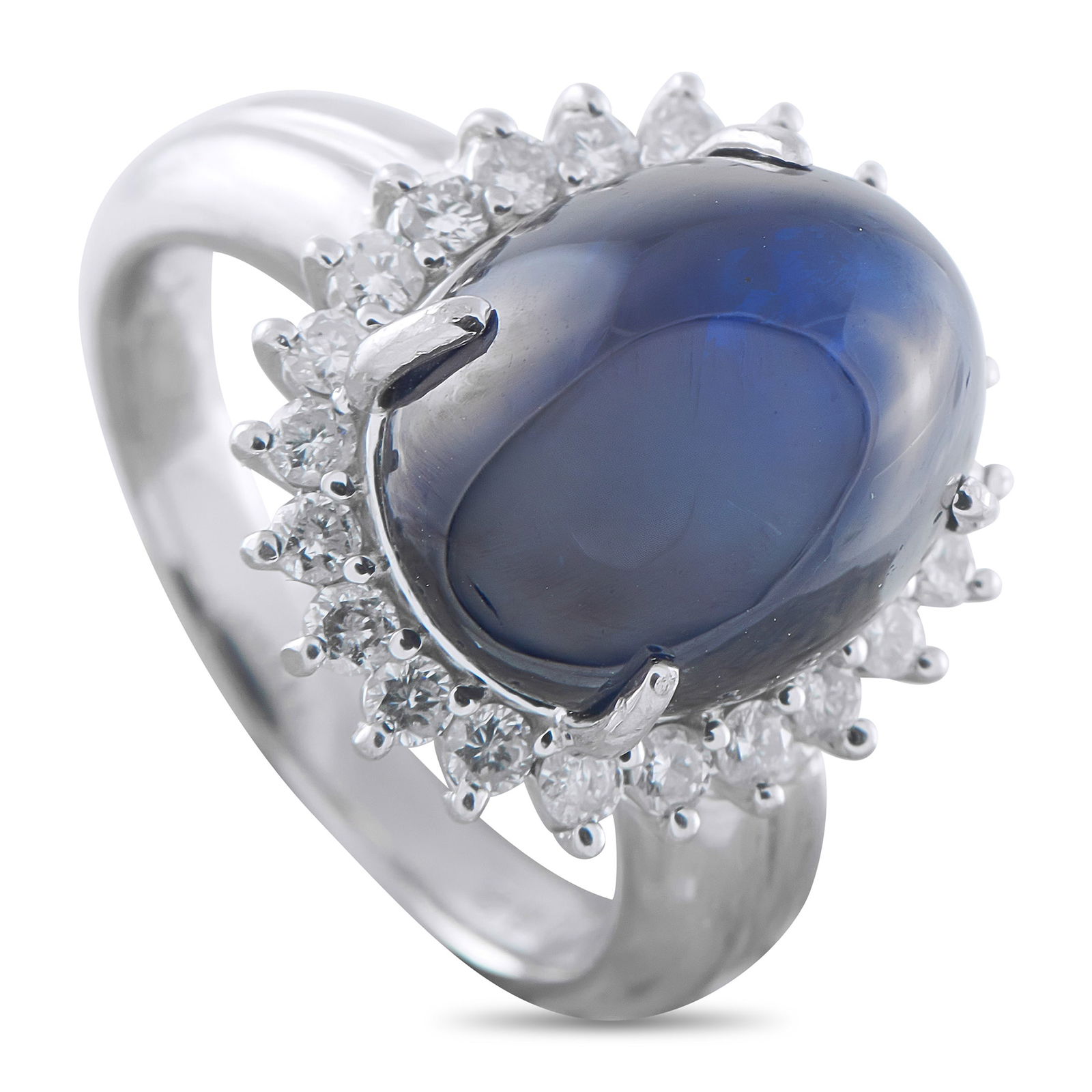 Platinum 0.62ct Diamond and Sapphire Ring: A timeless design ensures that this luxury ring will never go out of style. Set in Platinum, it features a captivating 13.22 carat Sapphire cabochon surrounded by a halo of sparkling Diamonds