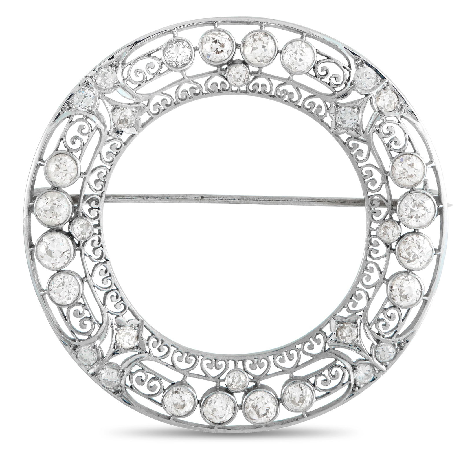 Platinum 3.75ct Diamond Wreath Brooch: A continuous ring of light. This Edwardian-style brooch is designed like a wreath, with lace-like filigree, pierced and patterned with repeating motifs. Round diamonds are embedded in smooth,