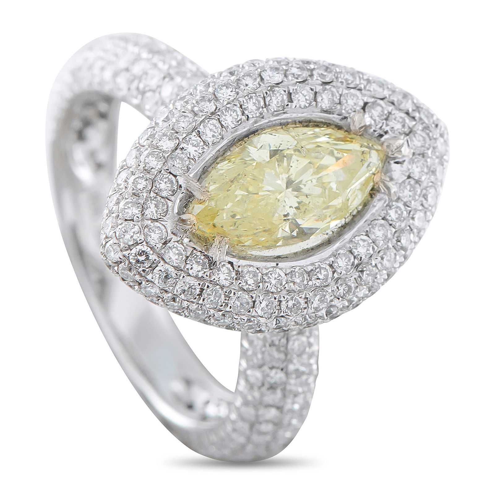 18K White Gold 2.55ct Diamond Ring: A 1.30 carat marquise cut Diamond adds a touch of warmth to this impeccably crafted ring. Set in 18K White Gold, inset Diamonds with a total weight of 1.25 carats make it a dazzling piece that will