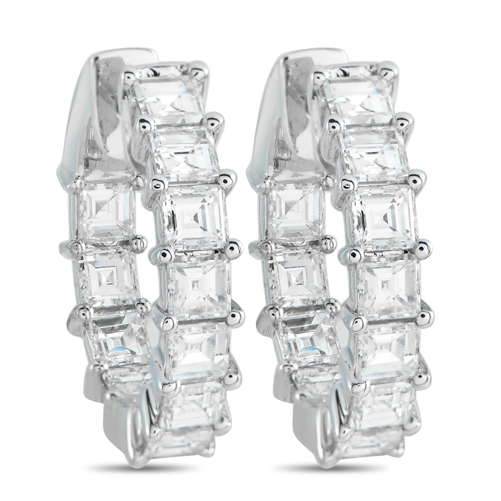 18K White Gold 3.25ct Diamond Inside-Out Hoop Earrings: Set with carré-cut diamonds in shared prongs, these 0.75-inch inside-out hoop earrings look visually strong even with their compact size. Each diamond is square and sharply faceted, with the