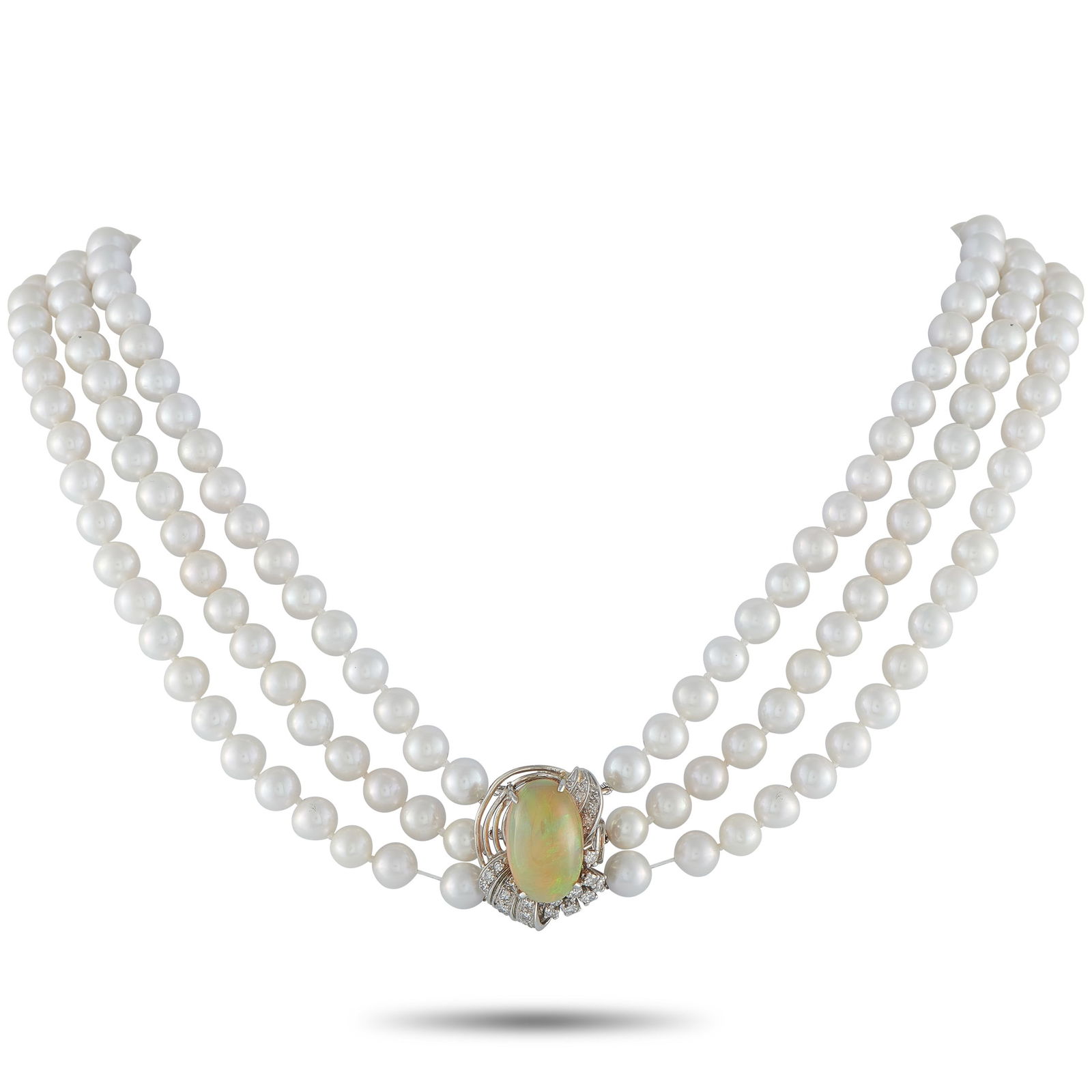 0.50ct Diamond, Opal, and Pearl Multi-Strand Necklace: Ideal for even your most special occasions, this luxury necklace exudes old fashioned elegance. A triple strand of 7mm Pearls makes it an instant classic. At the center of this 15” necklace, a s