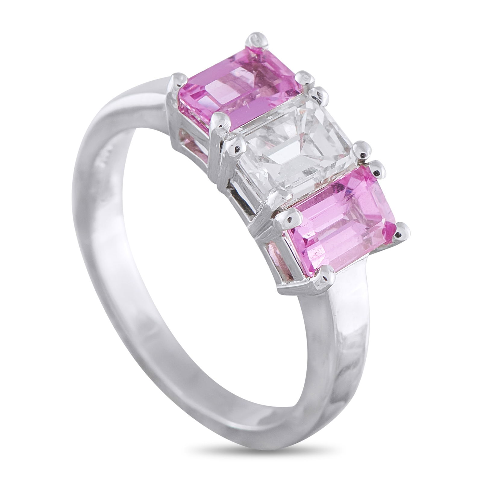 14K White Gold 1.05ct Diamond and Sapphire Ring: This luxury ring will instantly add a touch of charm and sophistication to any ensemble. A 1.05 carat Diamond center stone surrounded by Pink Sapphires with a total weight of 1.40 carats make this sim