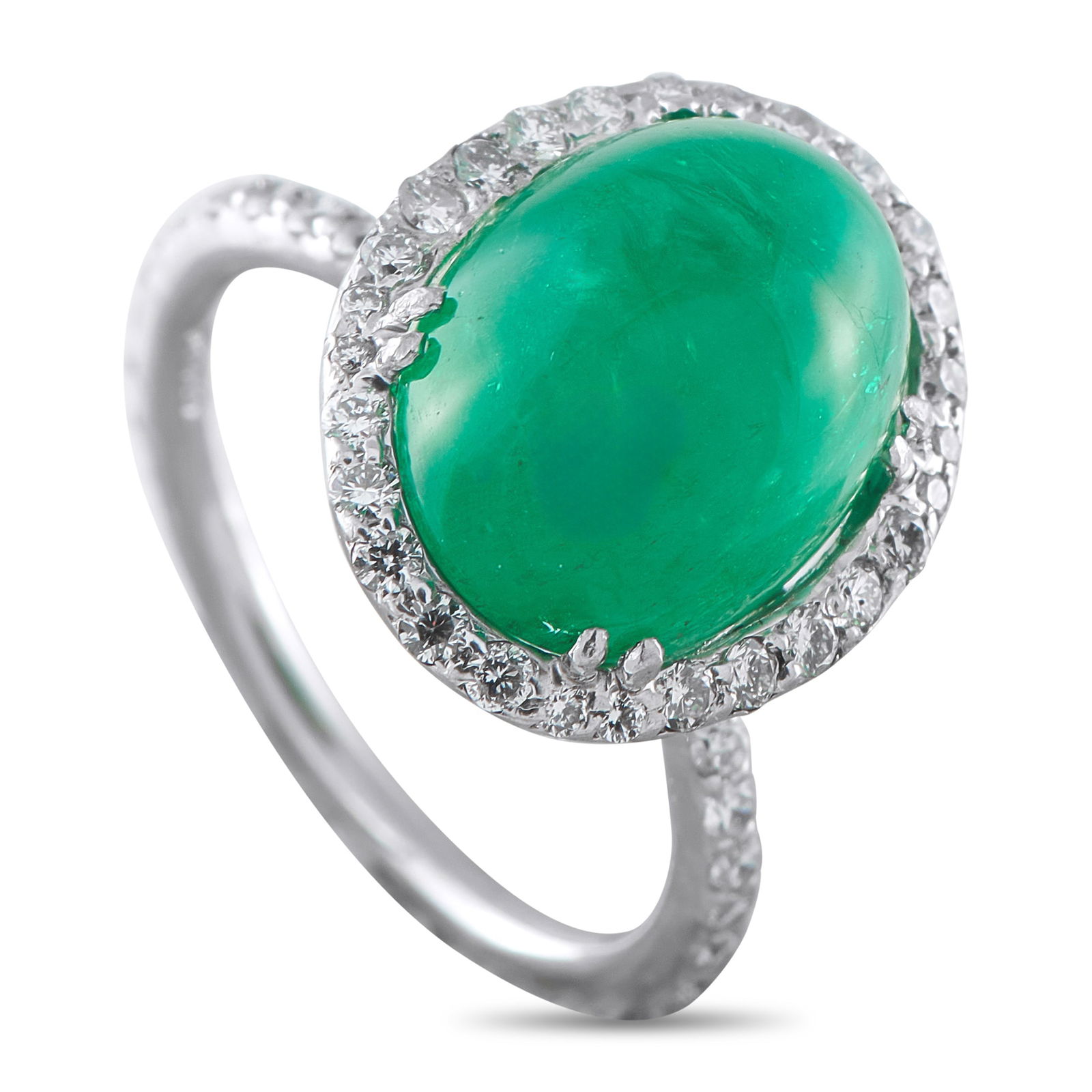Platinum 0.65ct Diamond and Colombian Emerald Cocktail Ring: Slender at the base, dramatic at the crown, this cocktail ring truly has a very high-impact look. A 1mm platinum band, traced with fine diamonds, supports a commmanidng 10mm-high top. At its center