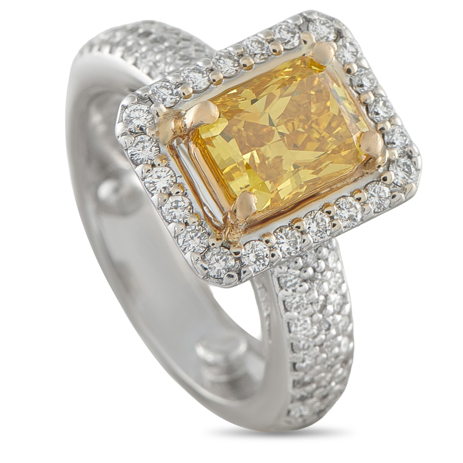 18K White Gold 3.10ct Diamond Ring: This sophisticated ring will simply never go out of style. Sparkling Diamonds with a total weight of 1.25 carats elevate the 18K White Gold setting, while a 1.85 carat colored Diamond adds stylish