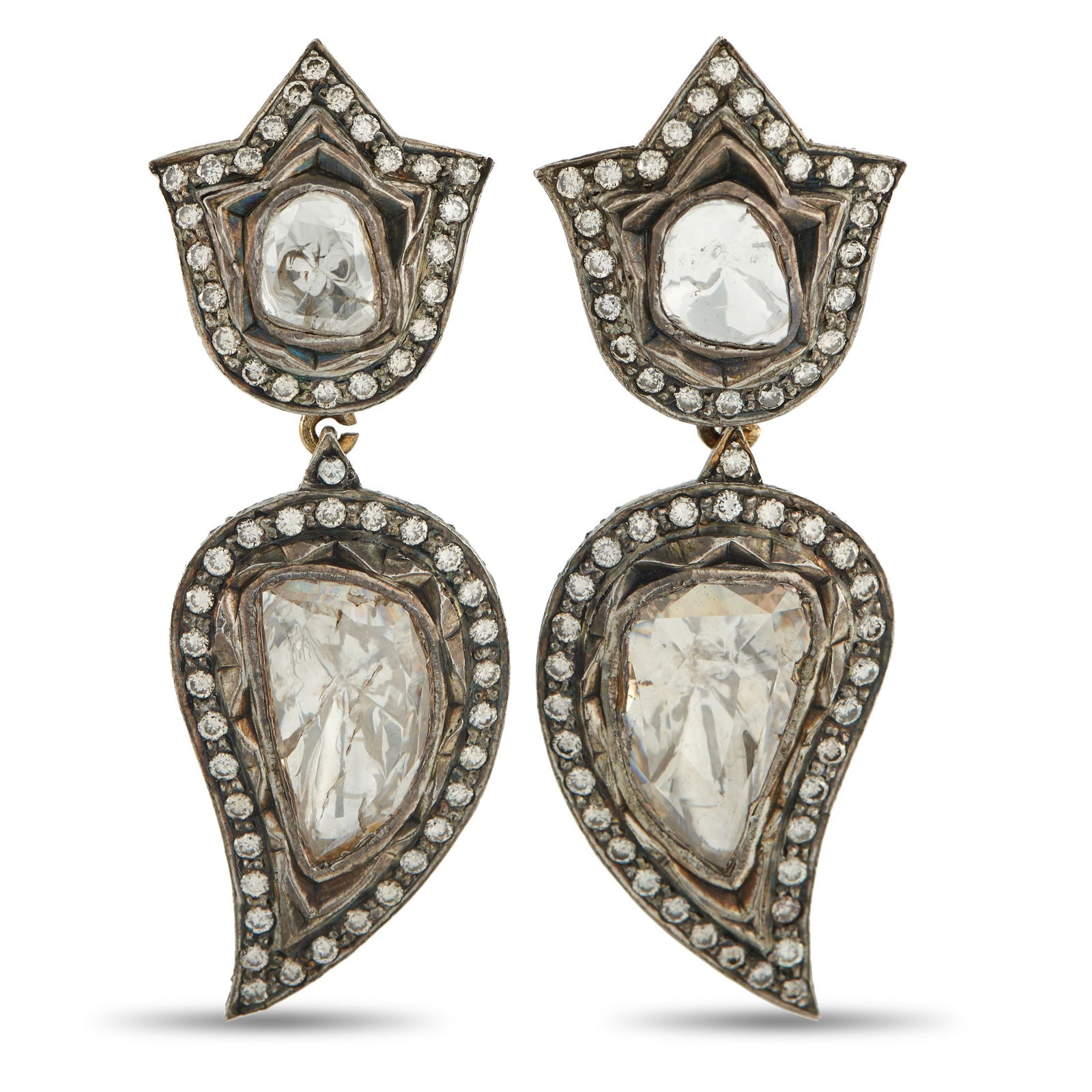 18K Yellow Gold and Silver 7.65ct Diamond Earrings: These earrings are bold, dramatic, and incredibly eye-catching. Crafted from a combination of 18K Yellow Gold and Silver, Diamonds with a total weight of 7.65 carats allow them to continually catch