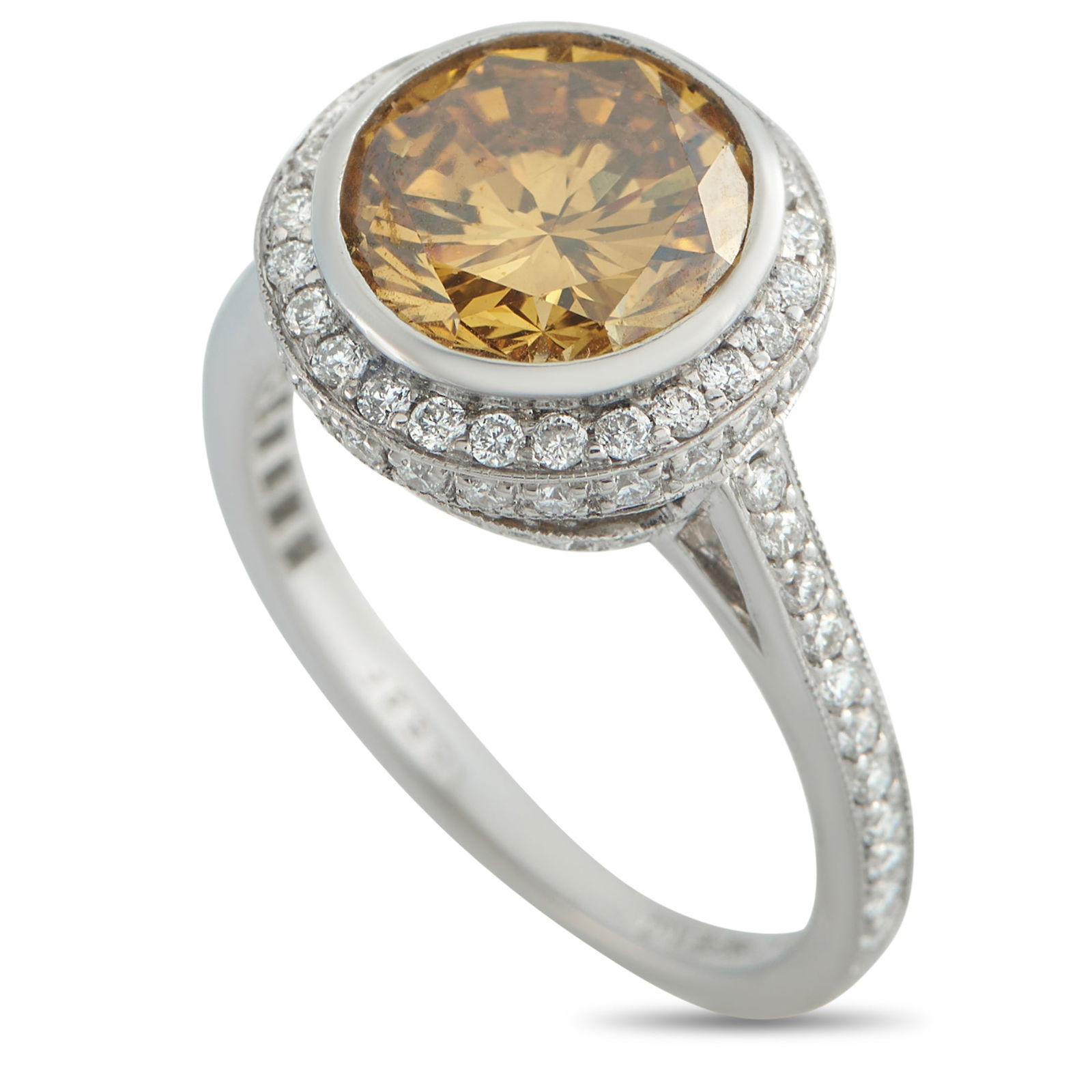 Platinum 3.65ct Diamond Ring: A 3.0 carat colored Diamond makes a statement at the center of this elegant luxury ring. Incredibly radiant, the Platinum setting shines brightly from every angle thanks to inset Diamond accents