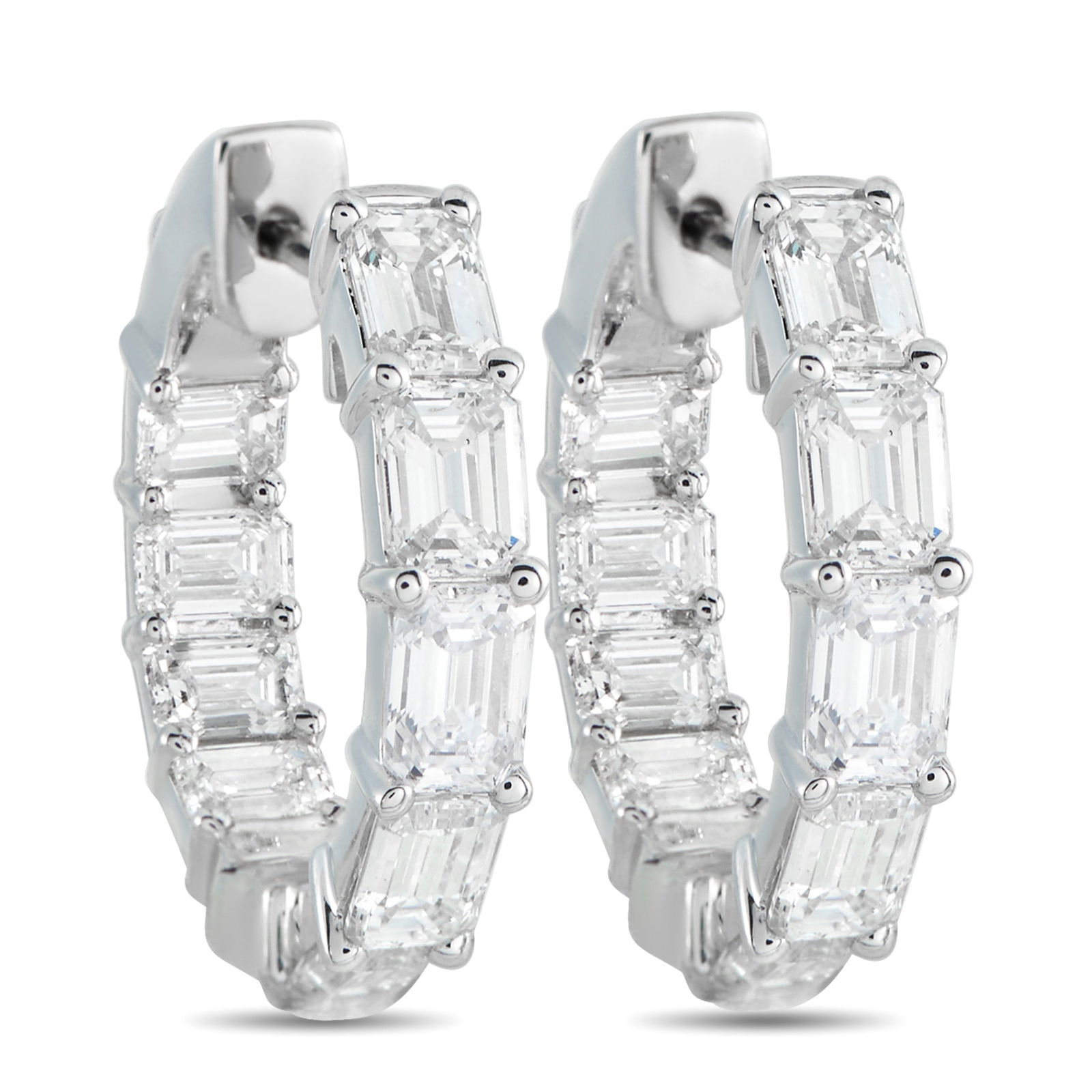 18K White Gold 3.80ct Diamond Inside-Out Hoop Earrings: A fresh perspective on a classic. These 18k white gold hoops feature baguette diamonds in shared prongs, arranged with clear intent. Along the outer front edge, the diamonds are placed north-south to