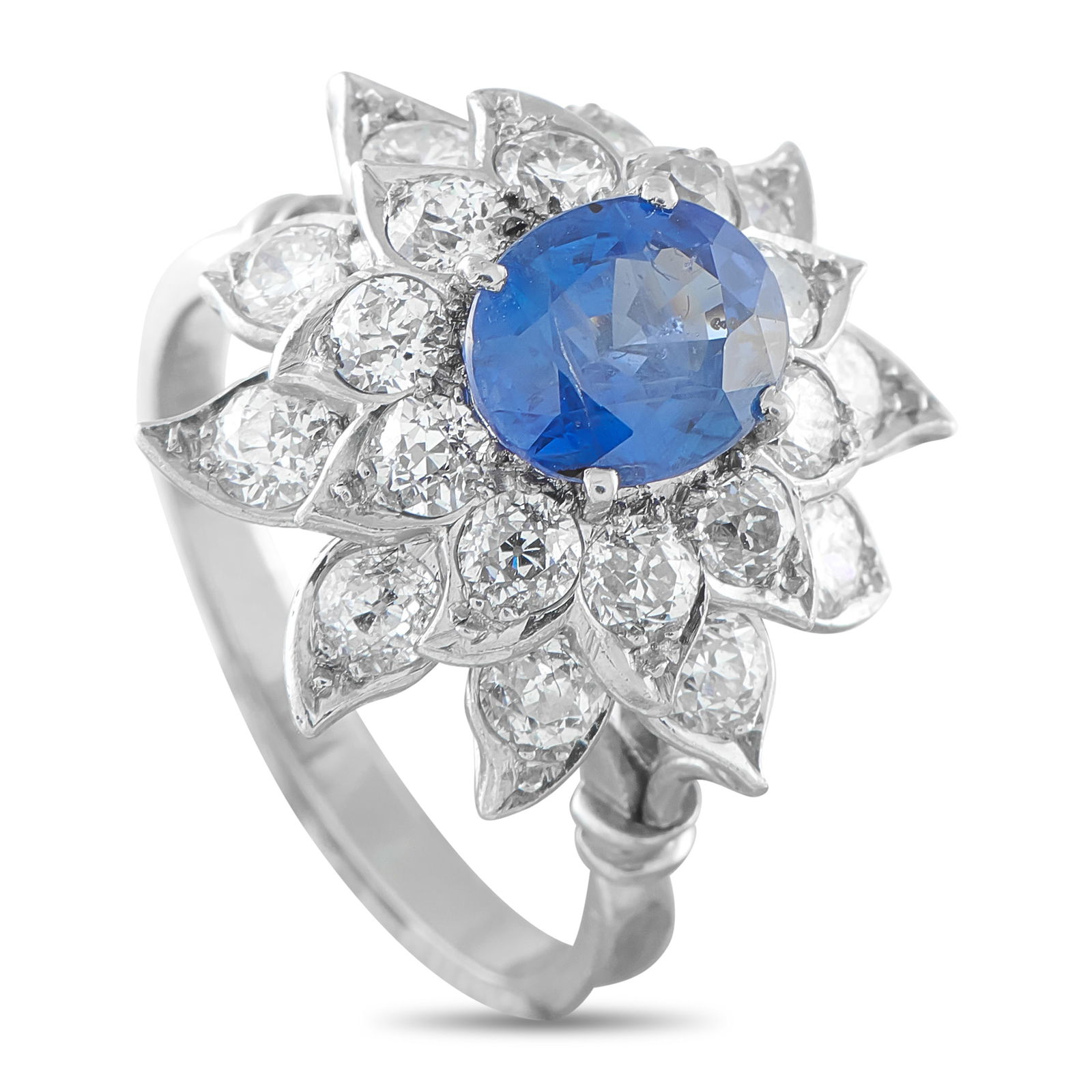 Platinum 2.25ct Diamond and Ceylon Sapphire Flower Ring: Inspired by nature, executed in precious stones and high-value precious metal. This flower-motif ring features a 2.87-carat Ceylon sapphire with no indications of thermal treatment. The blue oval gems