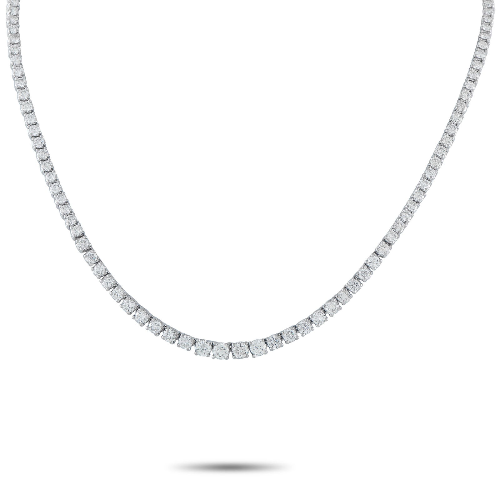 Platinum 12.50ct Diamond Tennis Necklace: A series of sparkling Diamonds totaling 12.50 carats makes this classic tennis necklace endlessly impressive. Stylish and perfectly understated, a cluster of Diamonds at the clasp provides an elegant