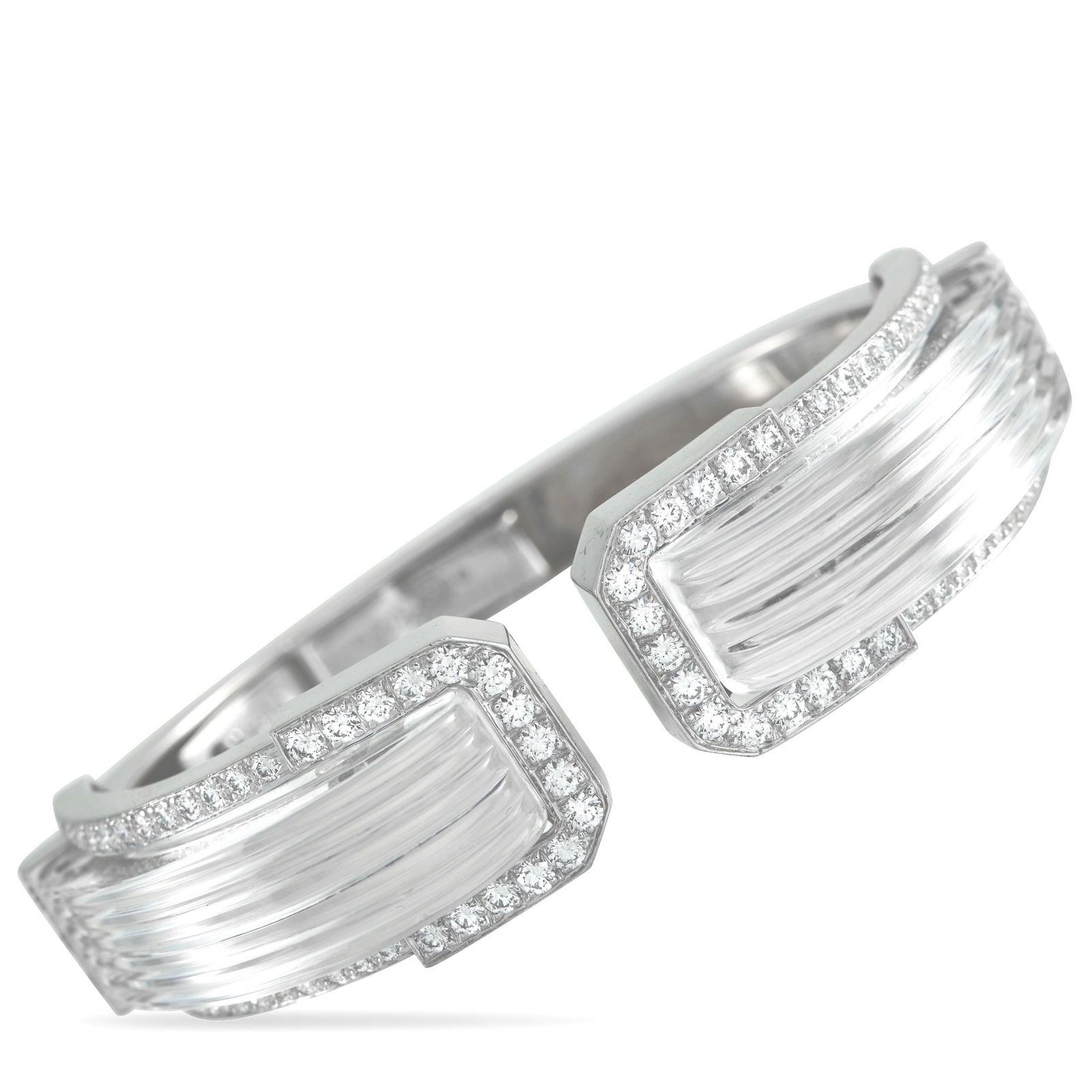 David WebbPlatinum and 18K White Gold 2.20ct Diamond and Rock Crystal White Night Cuff Bracelet: This White Night cuff bracelet belongs to the Twilight collection by David Webb, a series created for jewelry that glitters after dark. Webb is known for championing rock crystal as a white