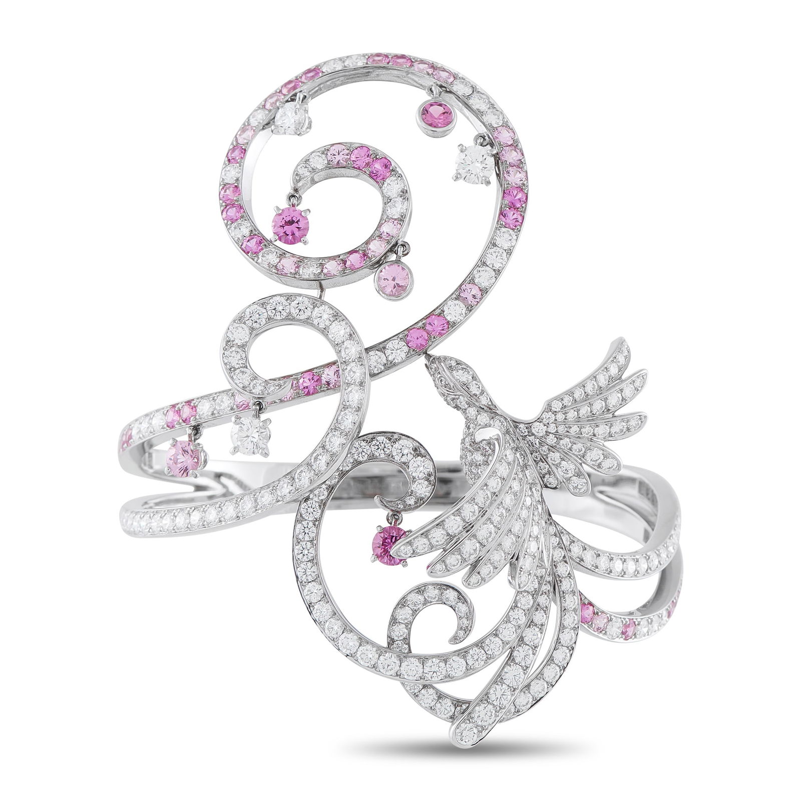 Van Cleef & Arpels 18K White Gold Diamond and Pink Sapphire Birds of Paradise Bracelet: From Van Cleef & Arpels’ Oiseaux de Paradis collection, this rigid bracelet features a split-shank frame in 18K white gold, creating a sense of weightless motion. The metal transitions into curving