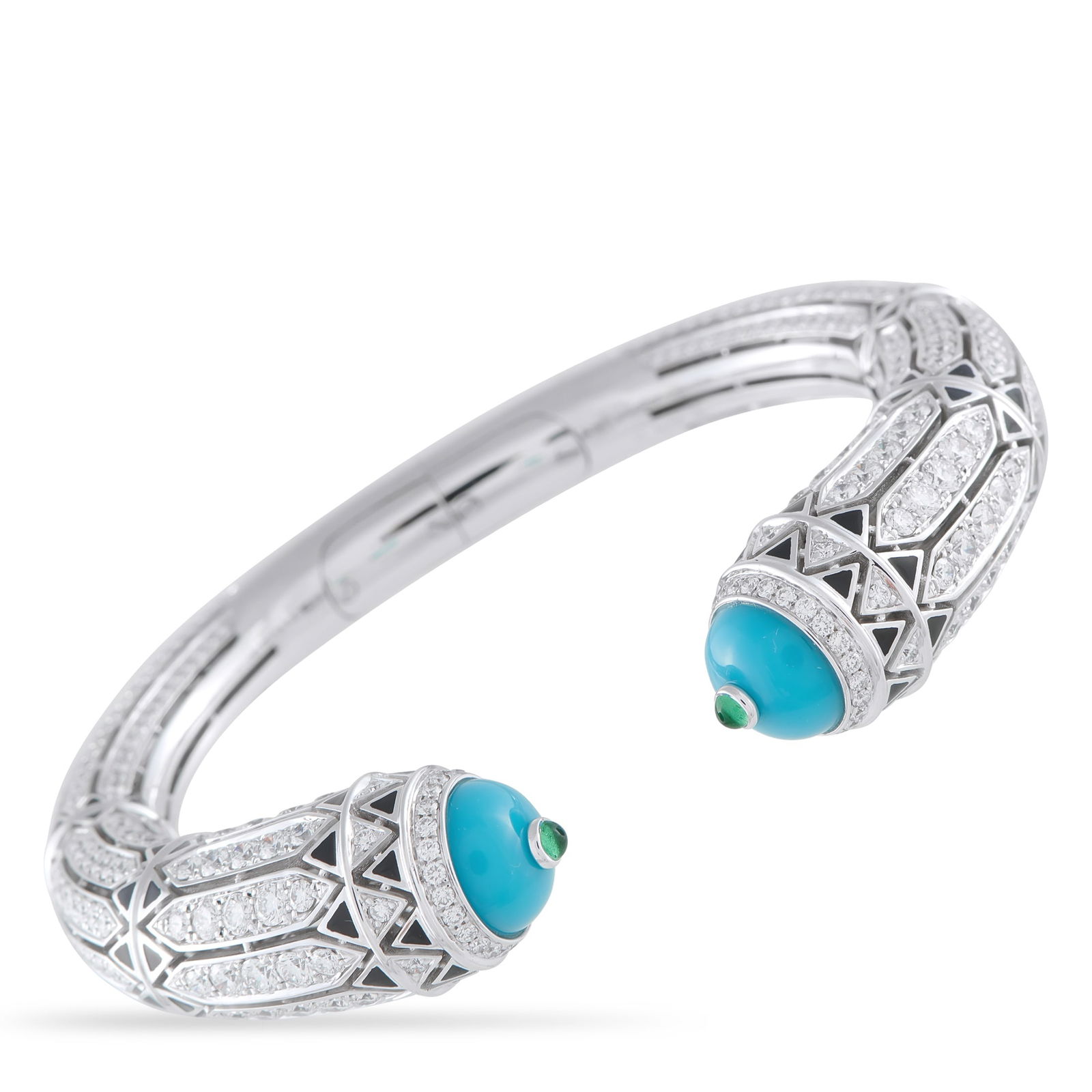 CartierGeometry & Contrast 18K White Gold 12.73 ct Diamond, Turquoise, and Emerald Bracelet: From Cartier’s Géométrie & Contrastes line, this Art Deco-inspired bracelet explores graphic balance and chromatic tension. A total of 540 diamonds, weighing 12.73 carats, cover the rigid white