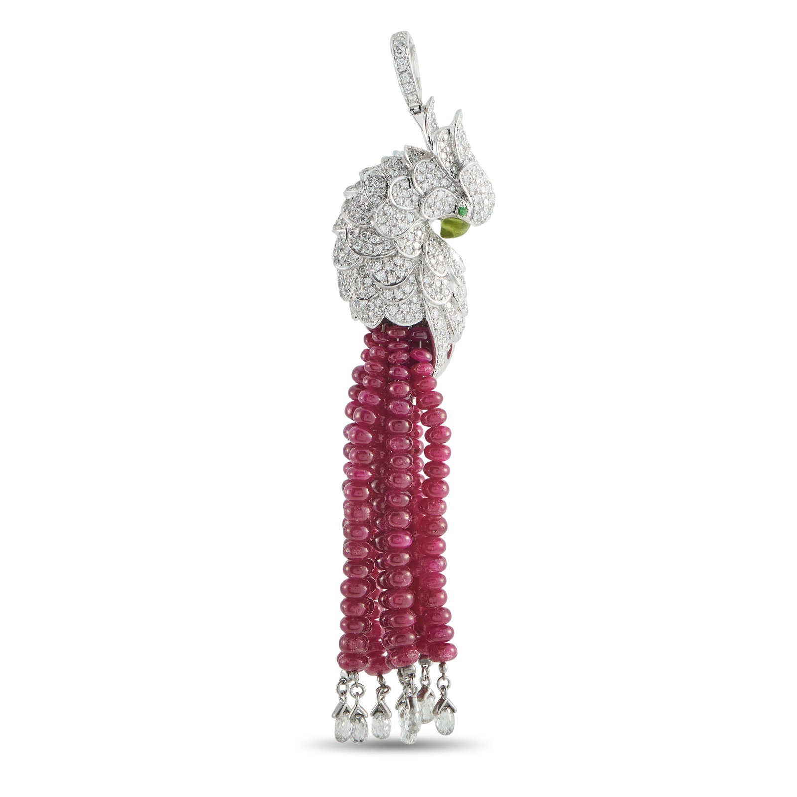 Exclusive 18K White Gold 8.5ct Diamond and Burma Ruby Parrot Pendant: Bold but easy to wear, this Exclusive parrot pendant makes a soulful tribute to being wild. The tropical bird is crafted in white gold and has its head and wings covered in pavé diamonds. Vibrant gre