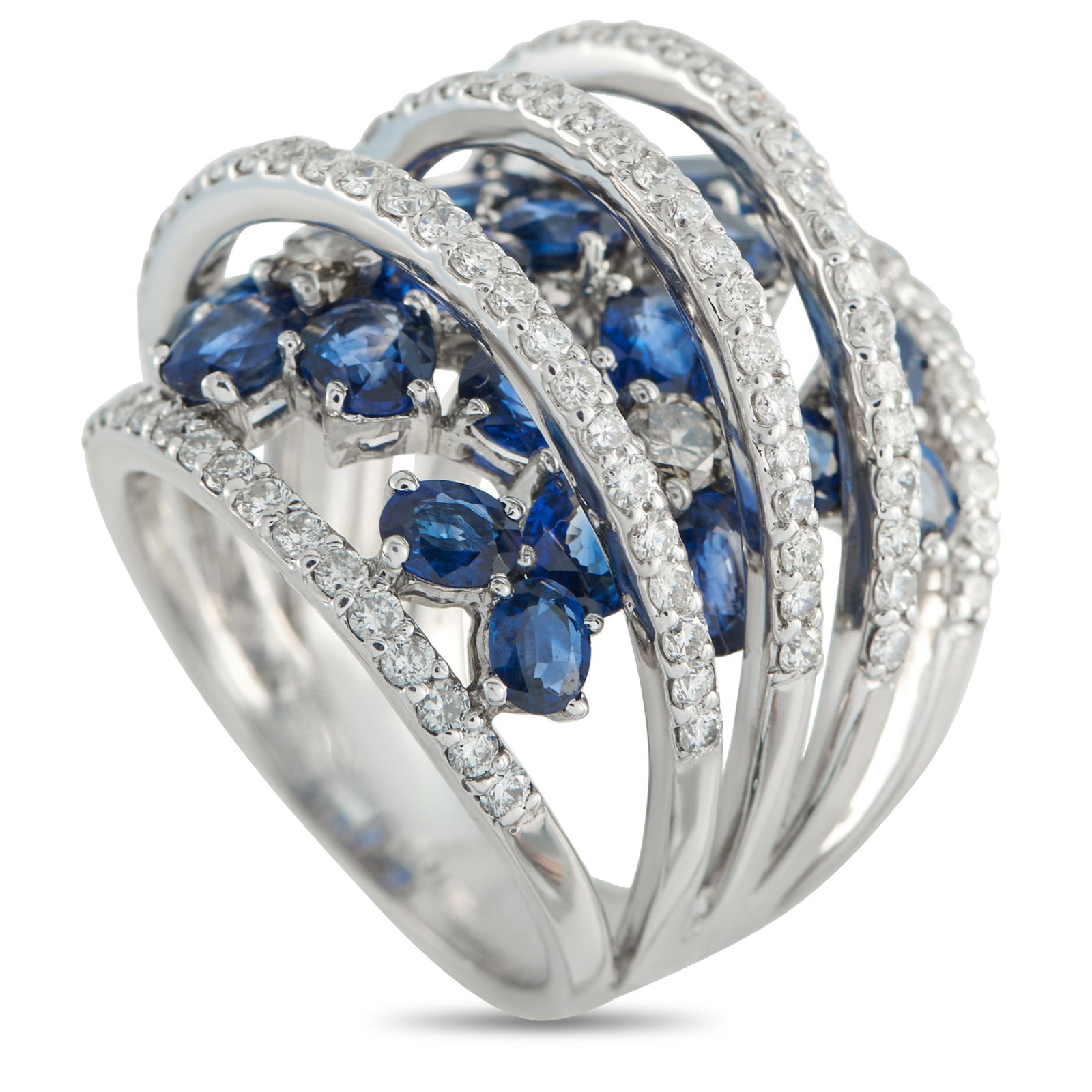 Exclusive 18K White Gold 2.28ct Diamond and Sapphire Ring: An Exclusive ring, perfect for when you want a bit of color that stays current. This wide band sits across the finger with a mosaic of sapphires, each held by prongs for a scattered effect. White gold