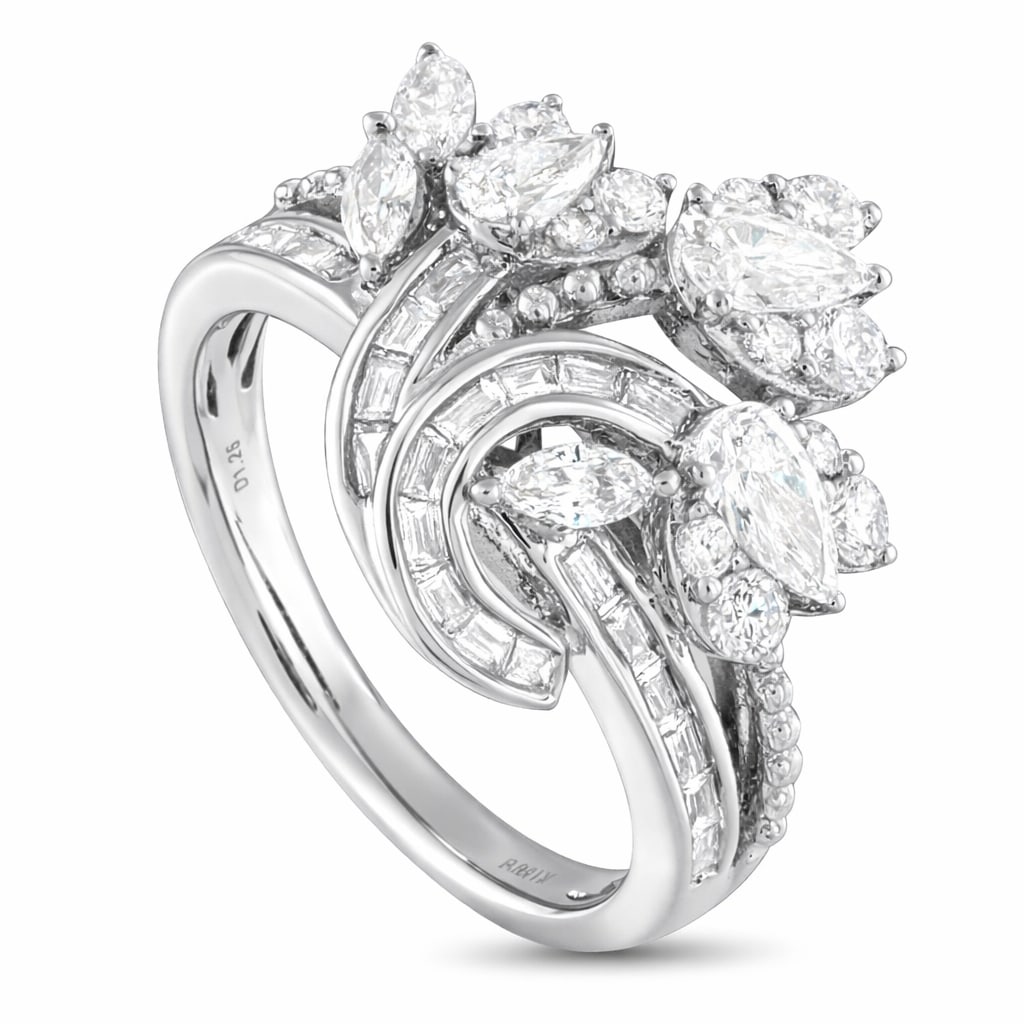 18 kt. White gold, EXCLUSIVE 18K White Gold 1.25ct Diamond Ring - 1.25ct. tw. Diamond (Natural): 18K White Gold 1.25ct Diamond In this Exclusive piece, the white gold band splits into two flowing ribbons, one ridged and the other lined with step-cut diamonds in an east-west channel setting. The r