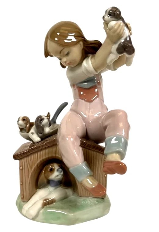 LLADRO PICK OF THE LITTER 1993 EVENT PORCELAIN FIGURINE 7621G: LLADRO PICK OF THE LITTER 1993 EVENT PORCELAIN FIGURINE 7621GLladro porcelain figurine titled Pick of the Litter, model number 7621, featuring a girl holding puppies, other dogs, and a bird on a dogho