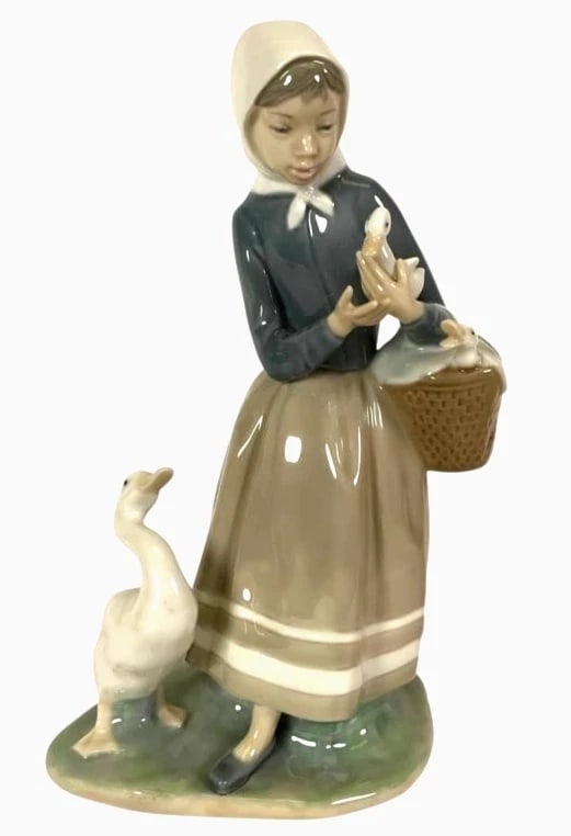 LLADRO SHEPHERDESS WITH DUCKS 1969-93 PORCELAIN FIGURINE 4568G: LLADRO SHEPHERDESS WITH DUCKS 1969-93 PORCELAIN FIGURINE 4568GLladro porcelain figurine titled 'Shepherdess with Ducks,' model number 4568. Measuring approximately 10 inches tall, it depicts a shepher