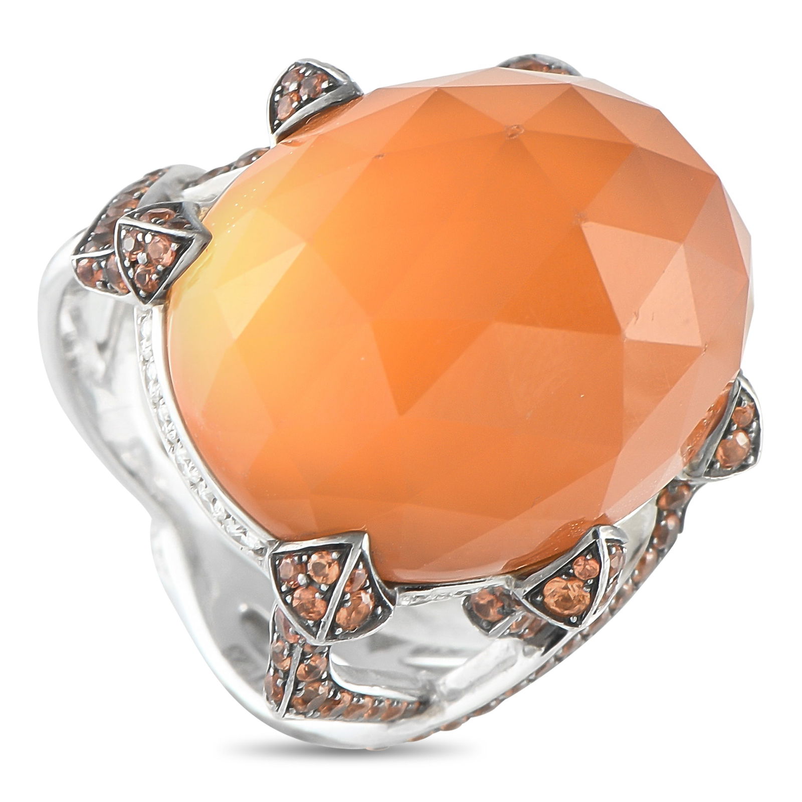 Stephen Webster 18K White Gold Diamond, Quartz, and Orange Sapphire Ring: This Stephen Webster 18K White Gold ring is incredibly unexpected. A bold 18K White Gold setting makes it breathtaking from virtually every angle. The sides shine to life thanks to inset Diamonds and