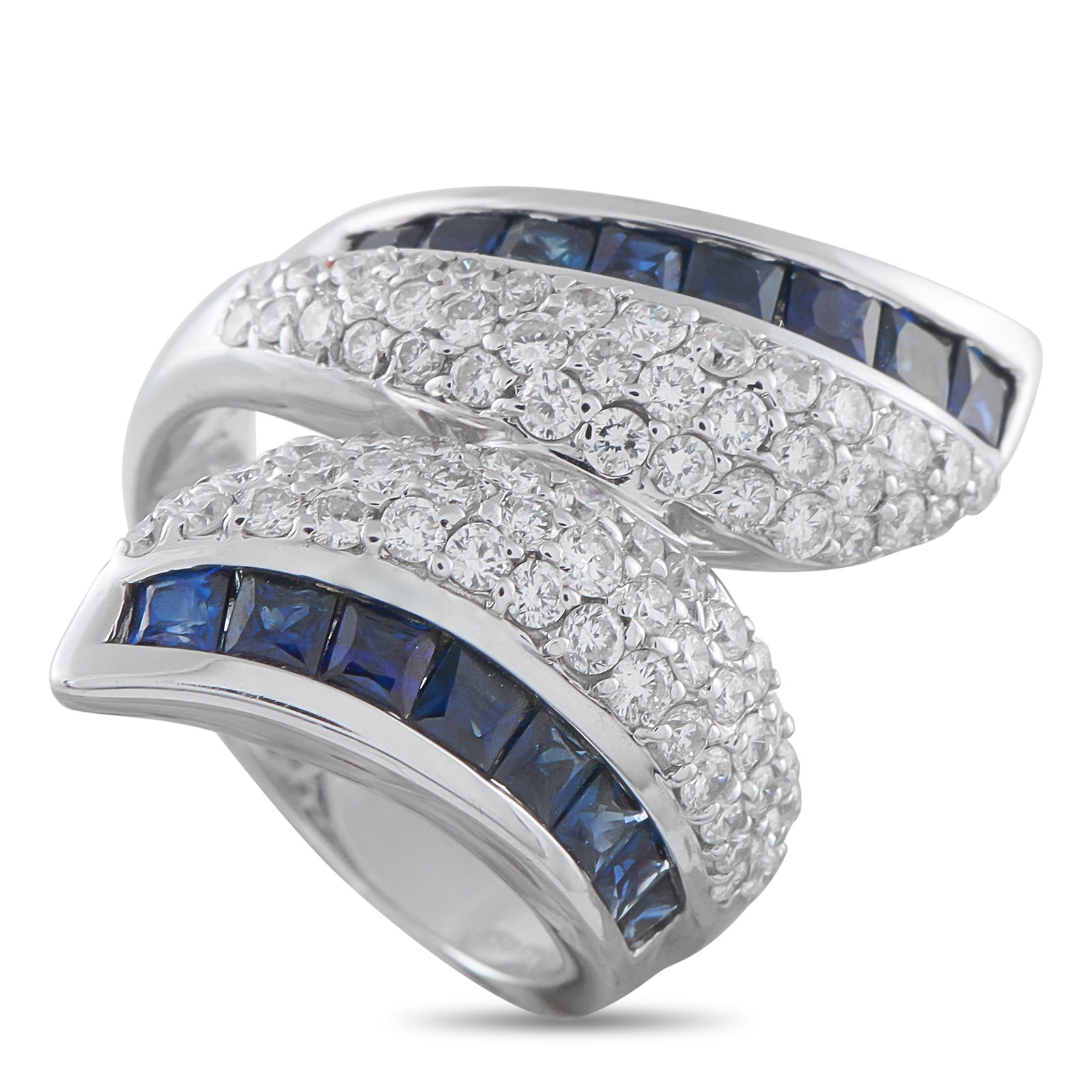 18K White Gold 1.42ct Diamond and Sapphire Ring: A sleek 18K White Gold setting seemingly wraps around the finger on this exquisite luxury ring. Diamonds with a total weight of 1.42 carats add sparkle to the center of the design, while Sapphire