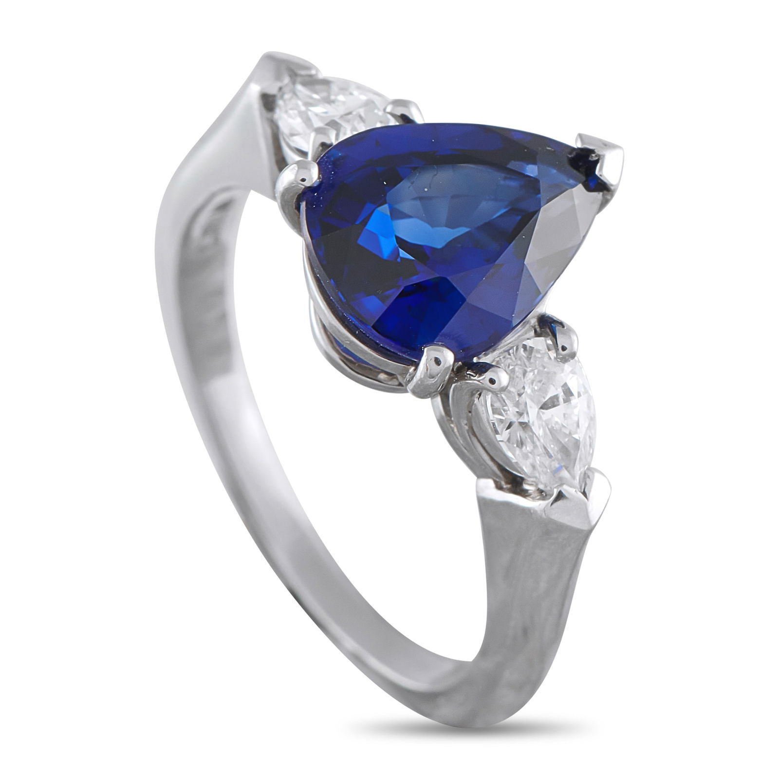 Platinum 0.59ct Diamond and Sapphire Ring: A 2.87 carat pear-shaped Sapphire center stone makes this radiant ring simply unforgettable. Crafted from Platinum, Diamonds totaling 0.59 carats flank the center stone and provide endless sparkle. A