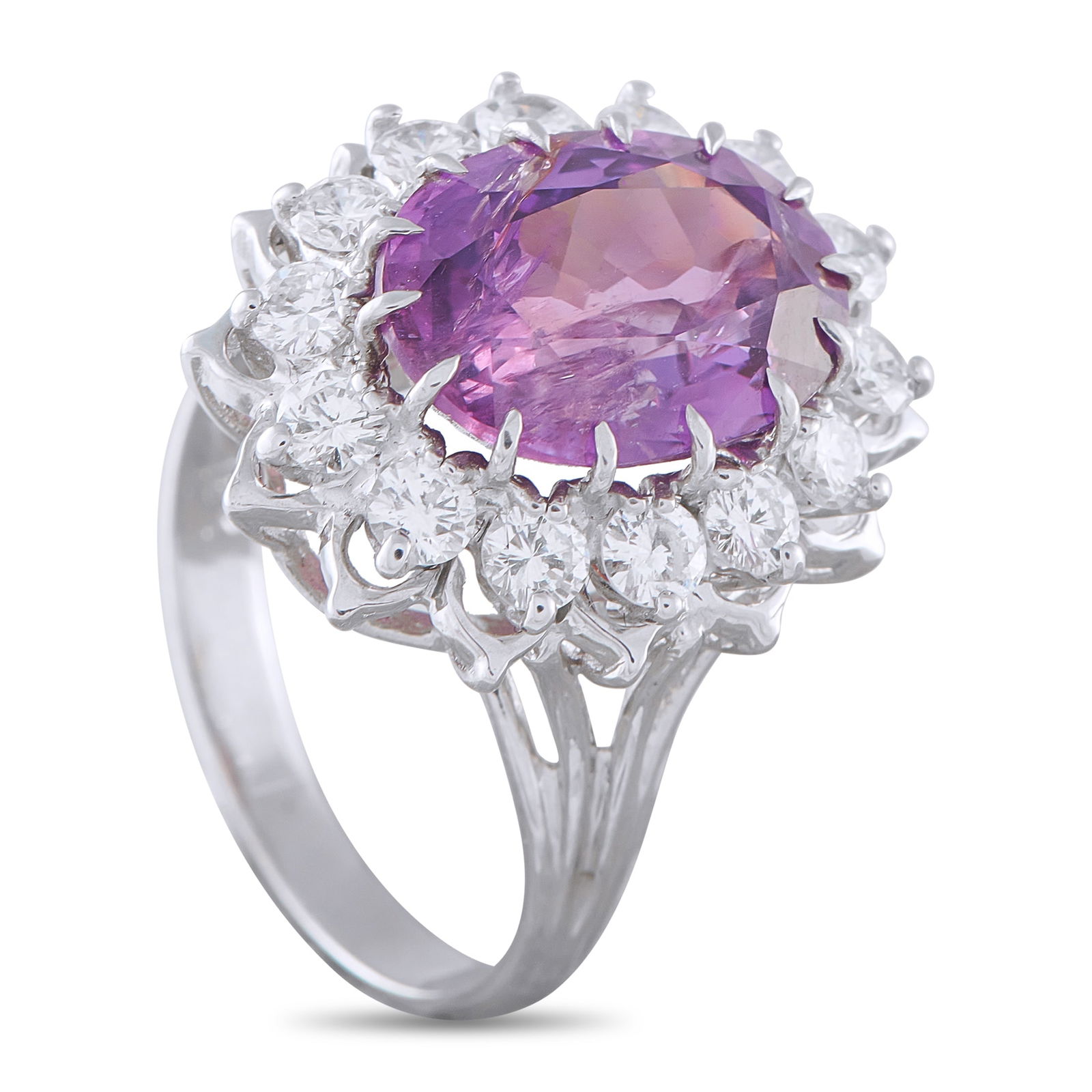 18K White Gold 1.12ct Diamond and Purple Sapphire Ring: This ring is the perfect piece for anyone who appreciates unconventional elegance. At the center, a 6.44 carat Purple Sapphire is poised to add a stylish pop of color to any ensemble. A halo of