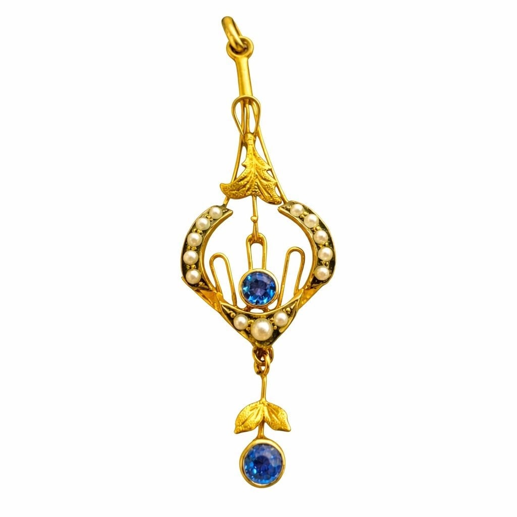 Antique Art Nouveau Natural Sapphire & Seed Pearl 14K Gold Pendant Sapphire: Antique Art Nouveau Natural Sapphire & Seed Pearl 14K Gold PendantAn elegant antique Art Nouveau pendant, crafted in Europe and exemplifying the refined artistry of the period. This beautifully design