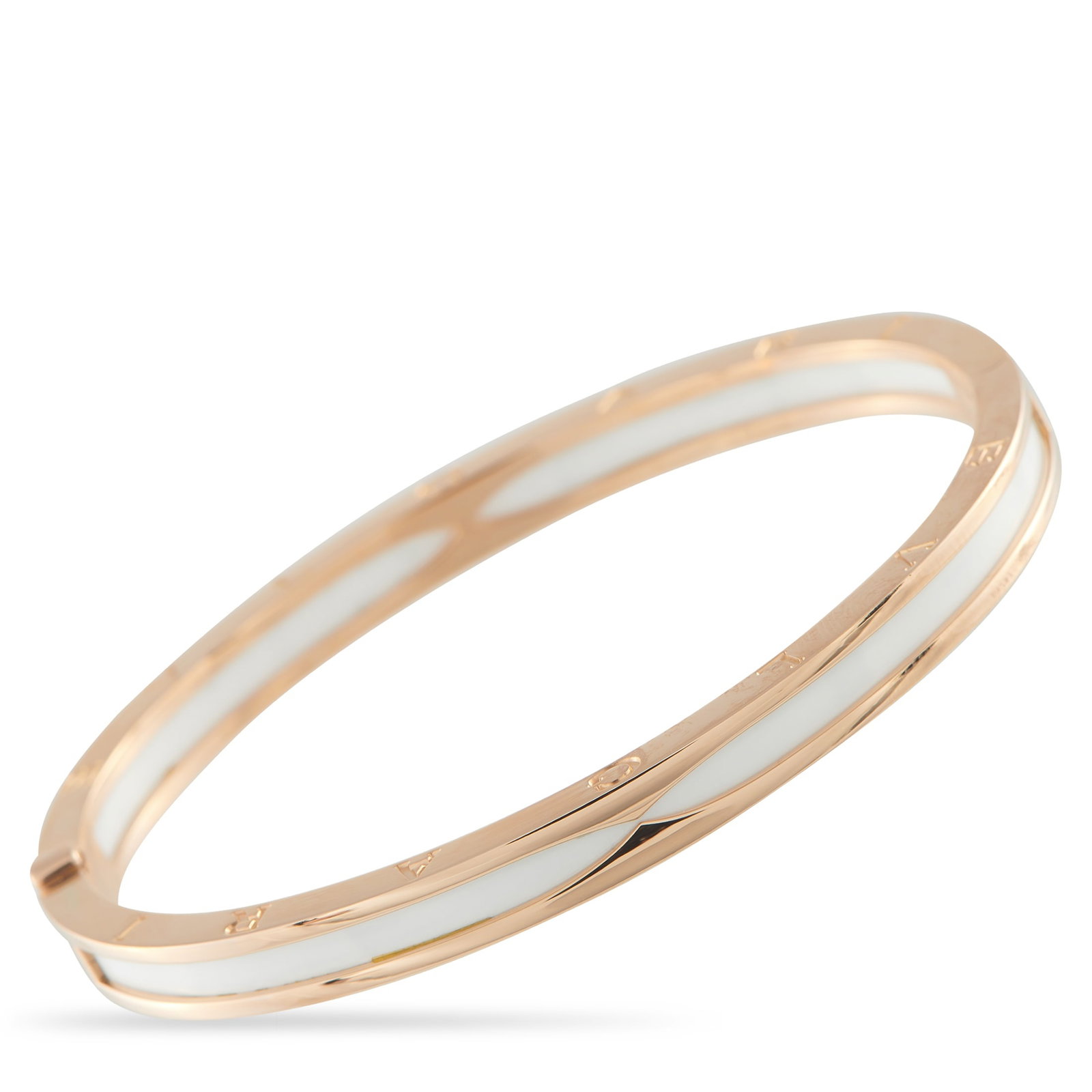 BVLGARI B.zero1 18K Rose Gold Ceramic Bracelet: Lustrous 18K Rose Gold adds extra elegance to this stunning Bvlgari B.Zero1 bracelet. The minimalist design includes a white accent at the center and the luxury brand’s signature engraved at each en