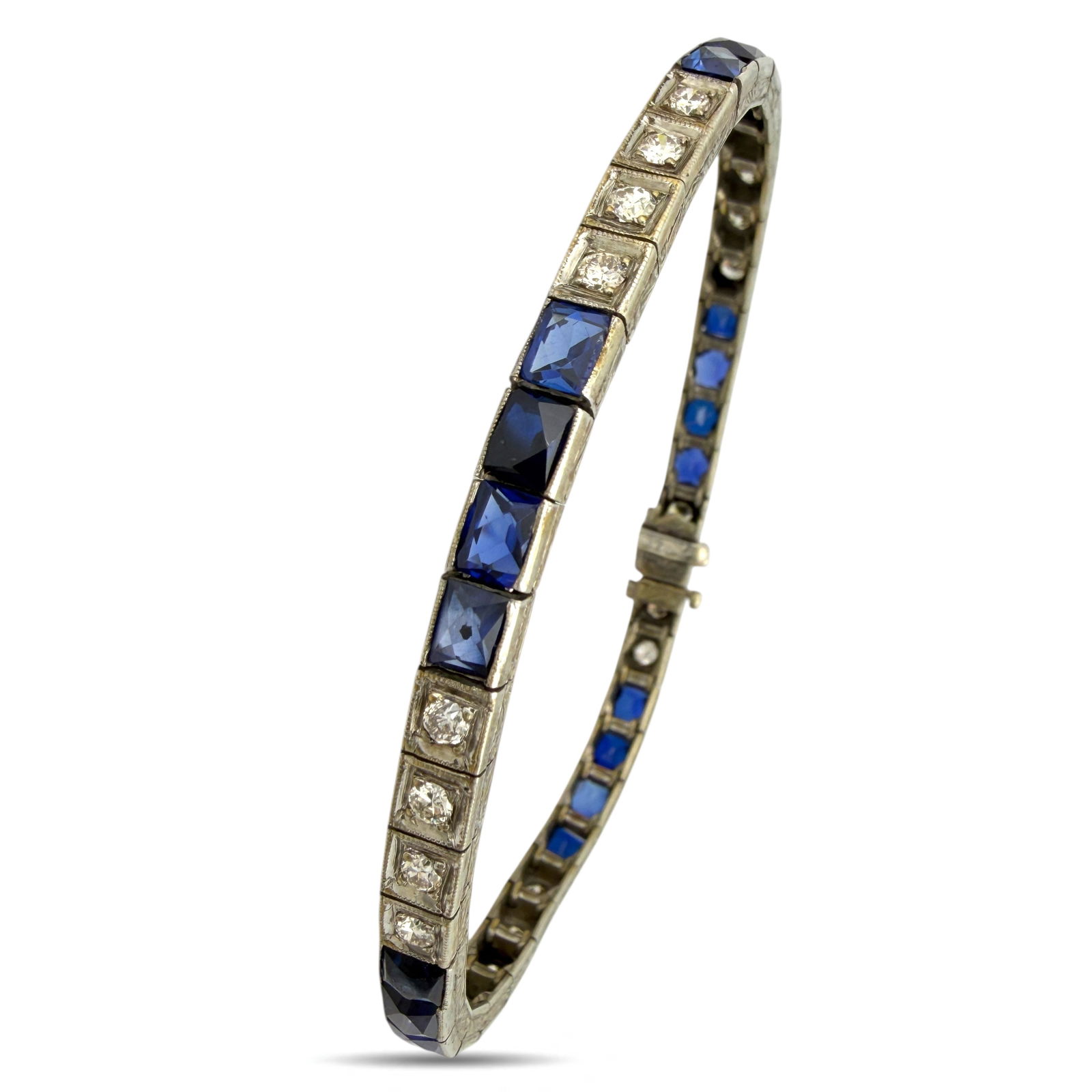 Bracelet Exclusive French Art Deco Platinum 2.08 Diamond and Sapphire Bracelet, Platinum - 2.08ct.: Exclusive French Art Deco Platinum 2.08 Diamond and Sapphire BraceletA striking example of refined Art Deco craftsmanship, this platinum bracelet showcases the period’s signature symmetry and elegan