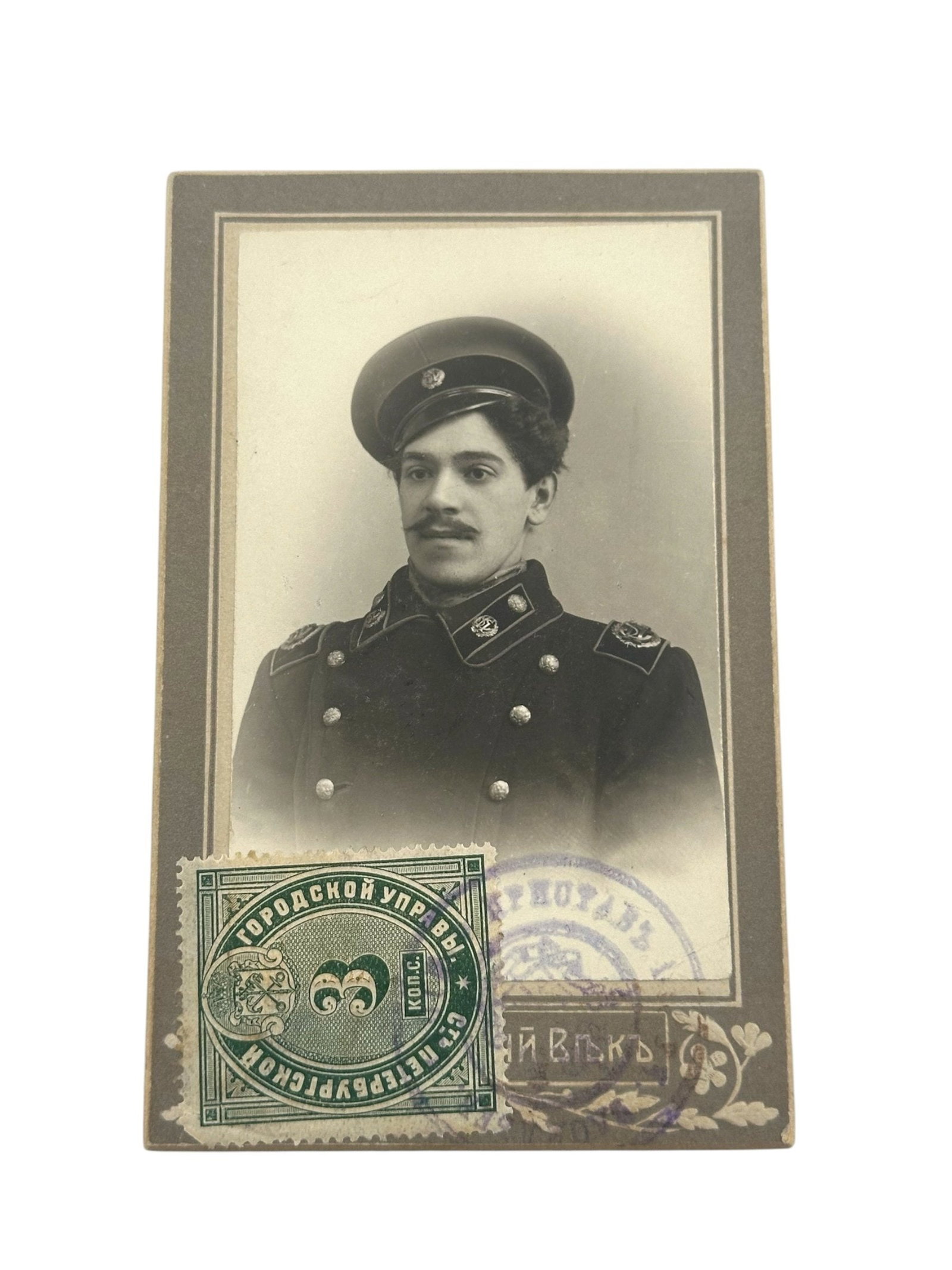 Photography in St. Petersburg, 61 Sadovaya Street - Unknown: Signed portrait of Imperial Russian official, captured in 1910. Photograph by a renowned photography company based in St. Petersburg.The green stamp is a 3 kopeck stamp from 1909, issued in Saint Pete