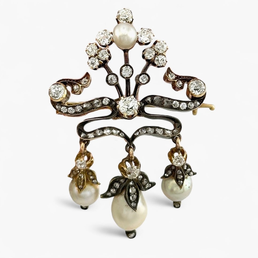14 kt. Yellow gold, Imperial Russian Period, 14K Gold (56 Zolotnik) 3.00ct Diamond & Pearl Floral: Faberge 14K Gold (56 Zolotnik) 3.00ct Diamond & Pearl Floral Brooch by Henrik WigströmAn exceptional Imperial Russian brooch crafted under the supervision of Henrik Wigström (1862–1923), the last