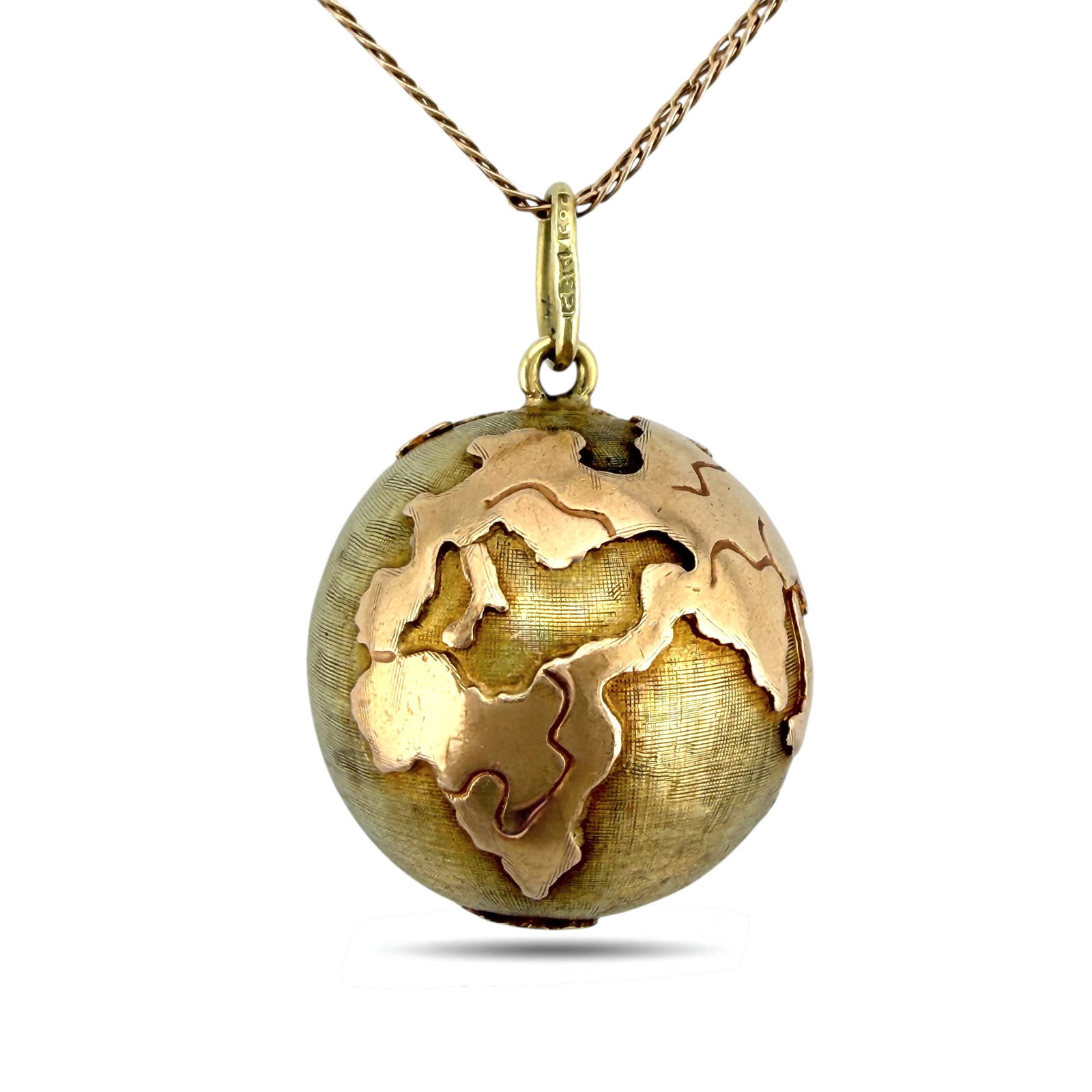 Pendant - 14 kt. Yellow gold, Exclusive 14K Yellow & Rose Gold Sculpted Earth Pendant, Rose gold: Exclusive 14K Yellow Gold Sculpted Earth PendantA distinctive round pendant crafted in warm 14 karat yellow gold, beautifully sculpted in the form of the Earth. The surface features dimensional detail