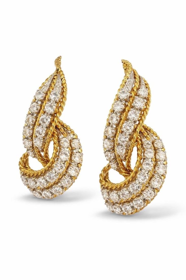 18K Yellow Gold & 3.84ct Diamond Earrings - 3.84ct. tw. Diamond (Natural): 18K Yellow Gold & 3.84ct Diamond EarringsAn elegant pair of 18K yellow gold earrings distinguished by their sleek, pointed silhouette and radiant diamond detailing. The design features 48 luminous dia
