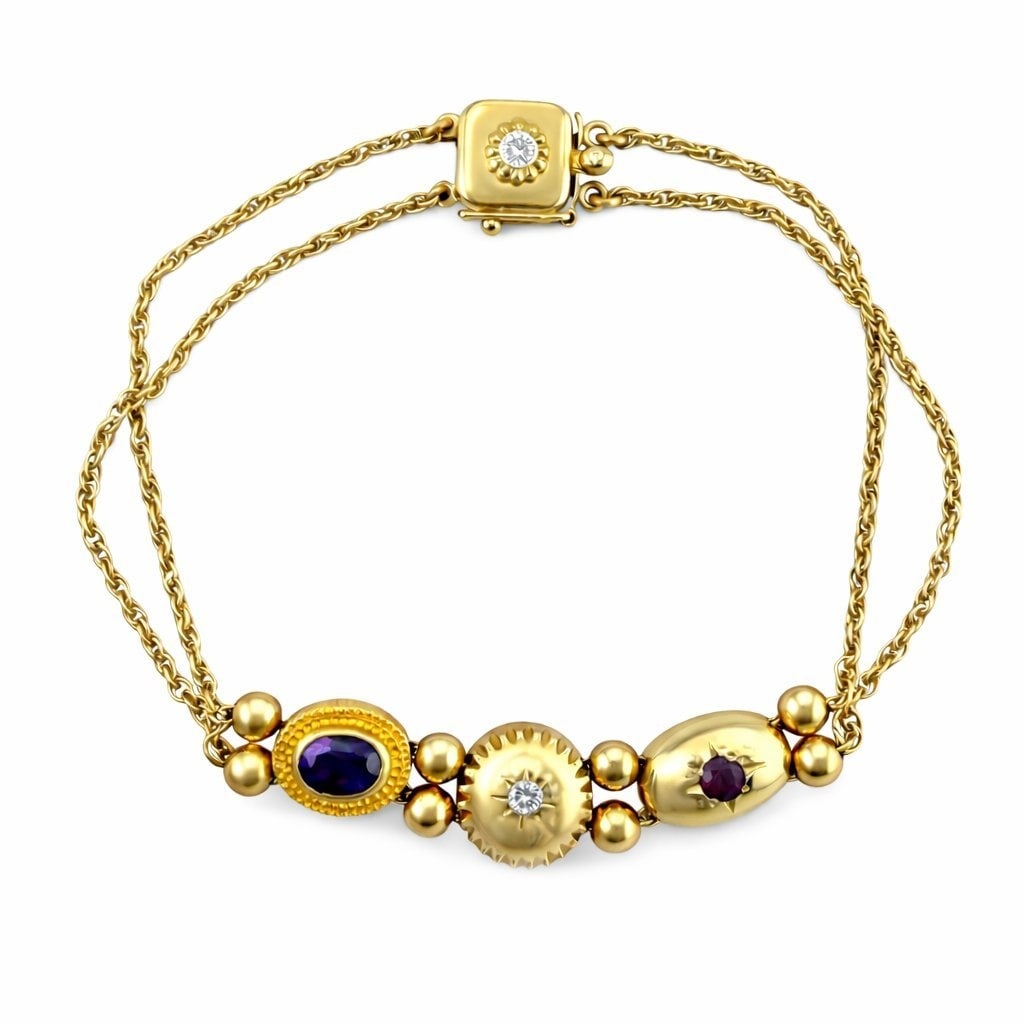 Bracelet - 14 kt. Yellow gold, Exclusive 14K Yellow Gold Amethyst Ruby and Diamond Bracelet Diamond: Exclusive 14 Karat Yellow Gold Diamond, Amethyst and Ruby Link BraceletA refined vintage Bracelets crafted in rich 14 karat yellow gold, designed with elegant flowing strands that converge into three