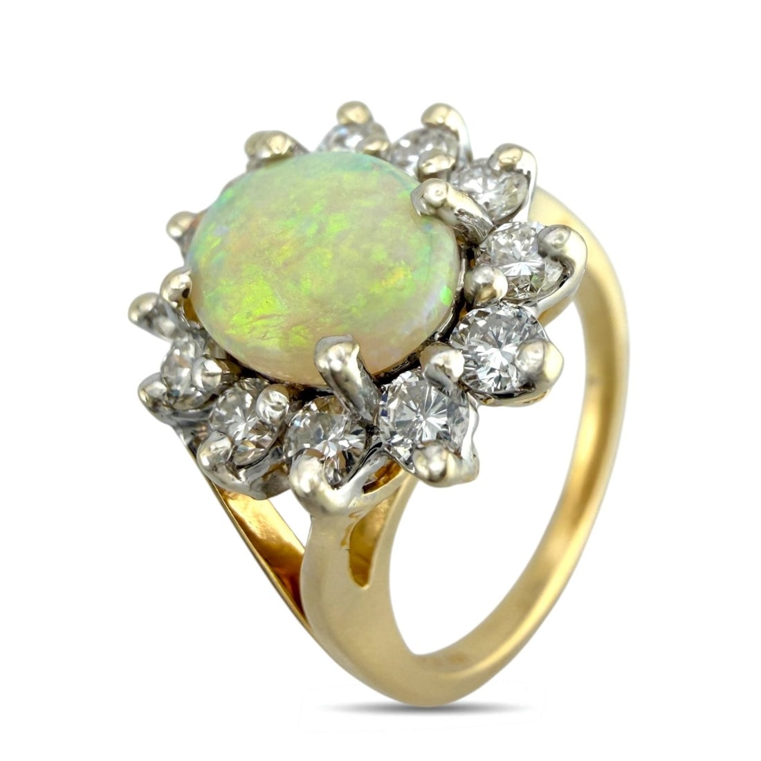 14K Yellow Gold Opal and 0.72ct Diamond Ring, Yellow gold - 0.72ct. tw. Diamond: Exclusive 14K Yellow Gold Opal and 0.72ct Diamond RingA refined and elegant piece, this ring showcases a luminous oval opal at its center, radiating soft flashes of color that shift beautifully with m