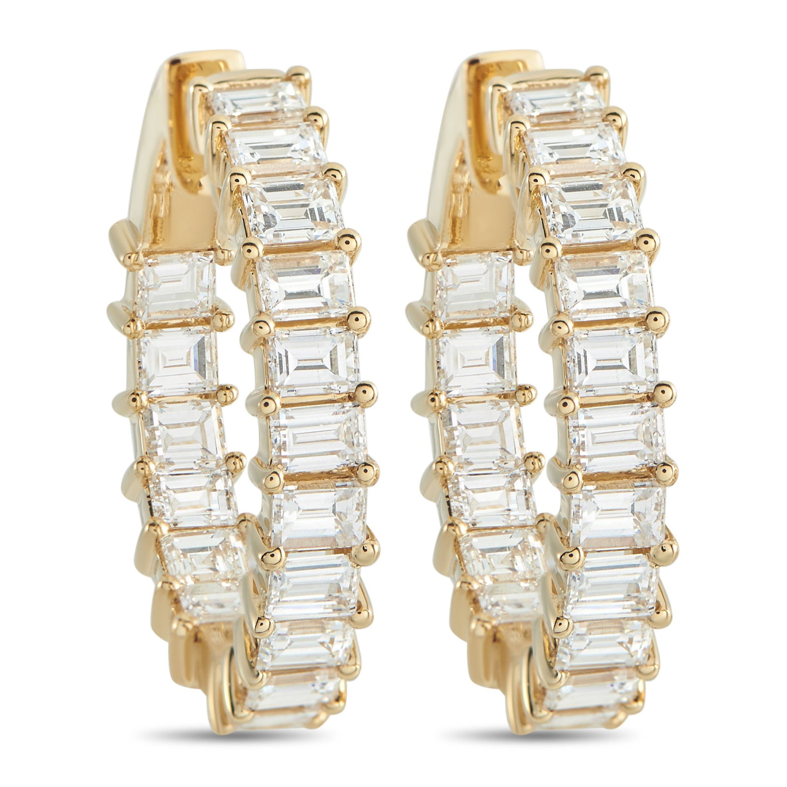 18K Yellow Gold 5.0ct Diamond Inside-Out Hoop Earrings: In 18k yellow gold, these 1.0-inch hoops are fully encircled with baguette diamonds set east-west in shared prongs. The step-cut diamonds cover the front exterior and inner-facing edge of the hoop, fo