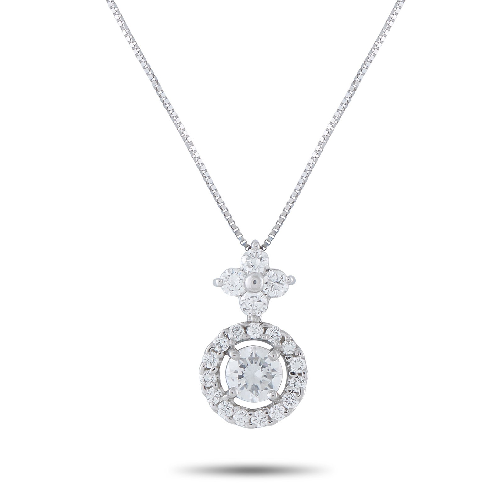 18K White Gold 0.95ct Diamond Pendant: Add a touch of sparkle to any ensemble with this exquisite necklace. Simple and stylish, the 18K White Gold pendant is elevated by the 0.50 carat Diamond center stone and additional Diamond accents to