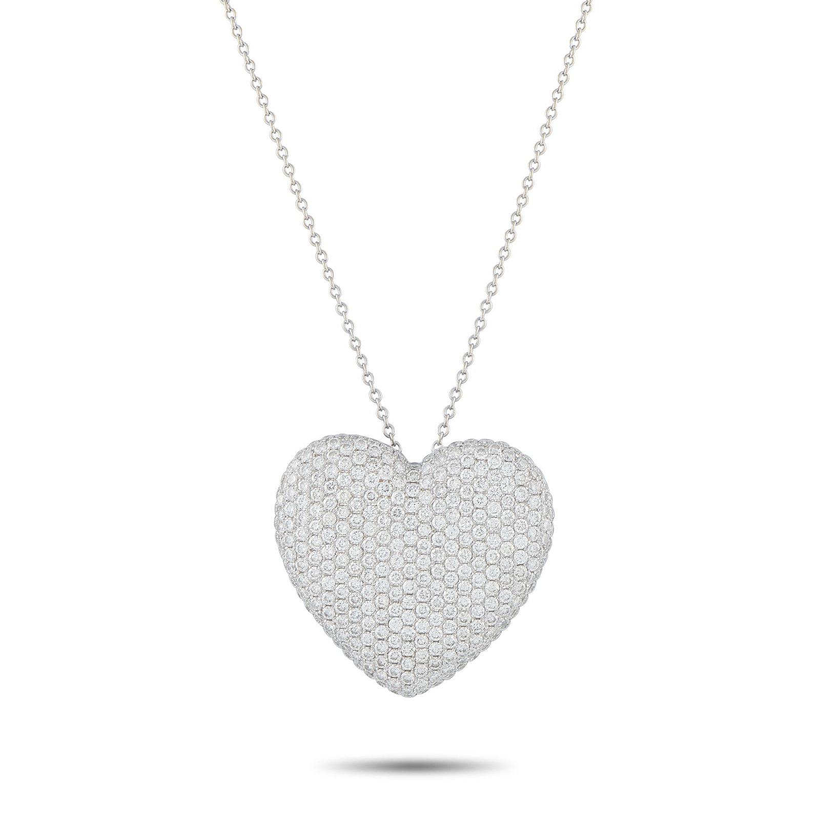 18K White Gold 3.10ct Diamond Heart Necklace: This dazzling necklace is as charming as it is elegant. Pave Diamonds with a total weight of 3.10 carats allow the heart-shaped pendant to continually catch the light. Crafted from 18K White Gold, the