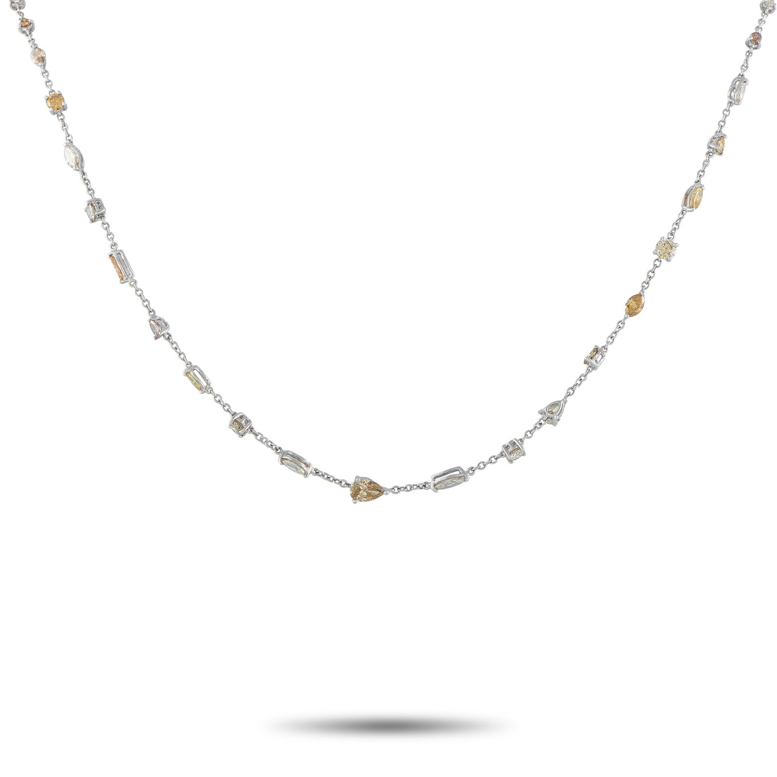 14K White Gold 5.50ct Multicolored Diamond Necklace: A series of sparkling Diamonds in a variety of colors and cuts makes this necklace an elegant addition to any ensemble. Set in 14K White Gold, together they possess a total weight of 5.50 carats. This