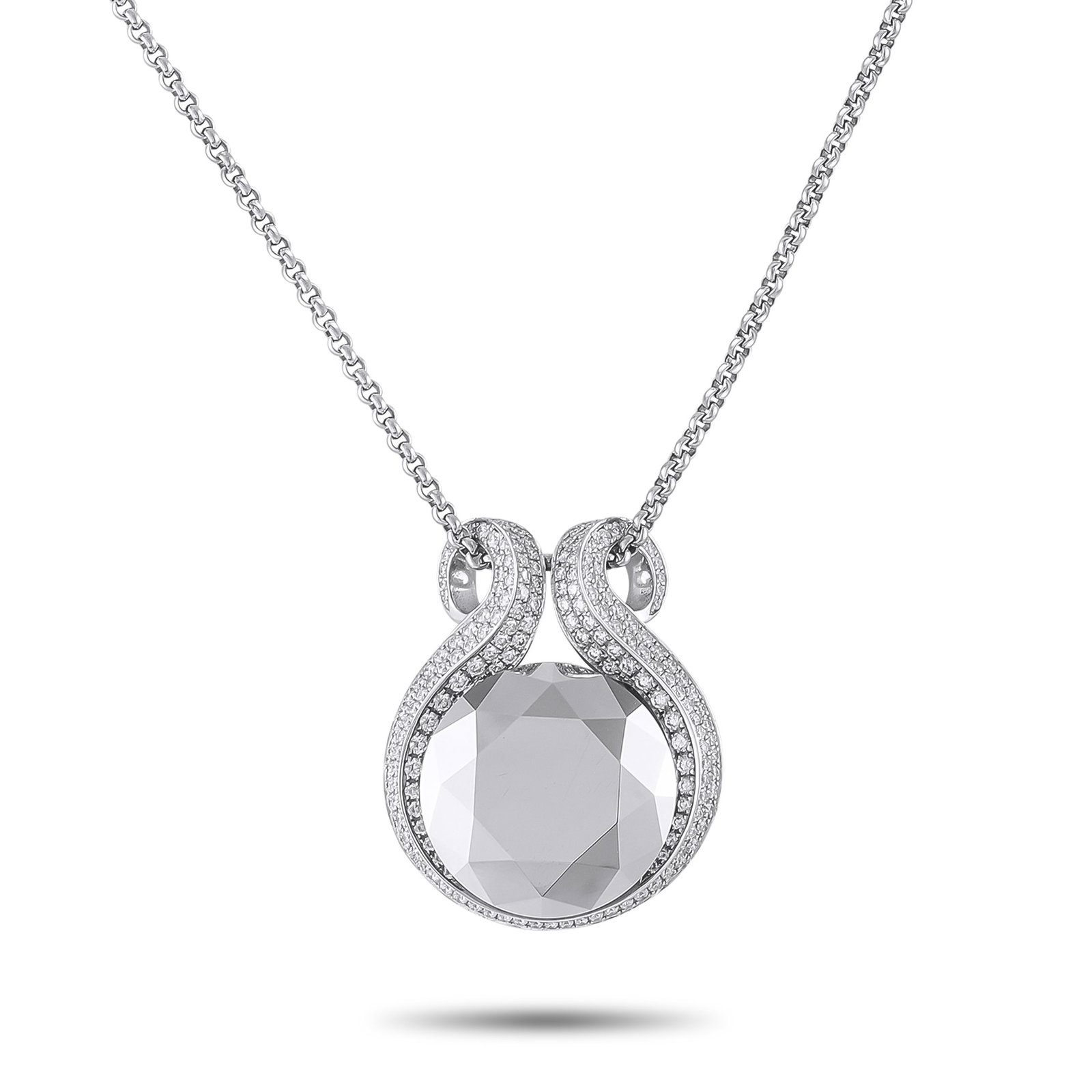CHOPARD 18K White Gold Diamond and Hematite Necklace: This Chopard necklace is undeniably breathtaking. At the center of the 18K White Gold pendant, a bold Hematite center stone instantly draws the eye. Inset Diamonds add even more opulence to this uniqu