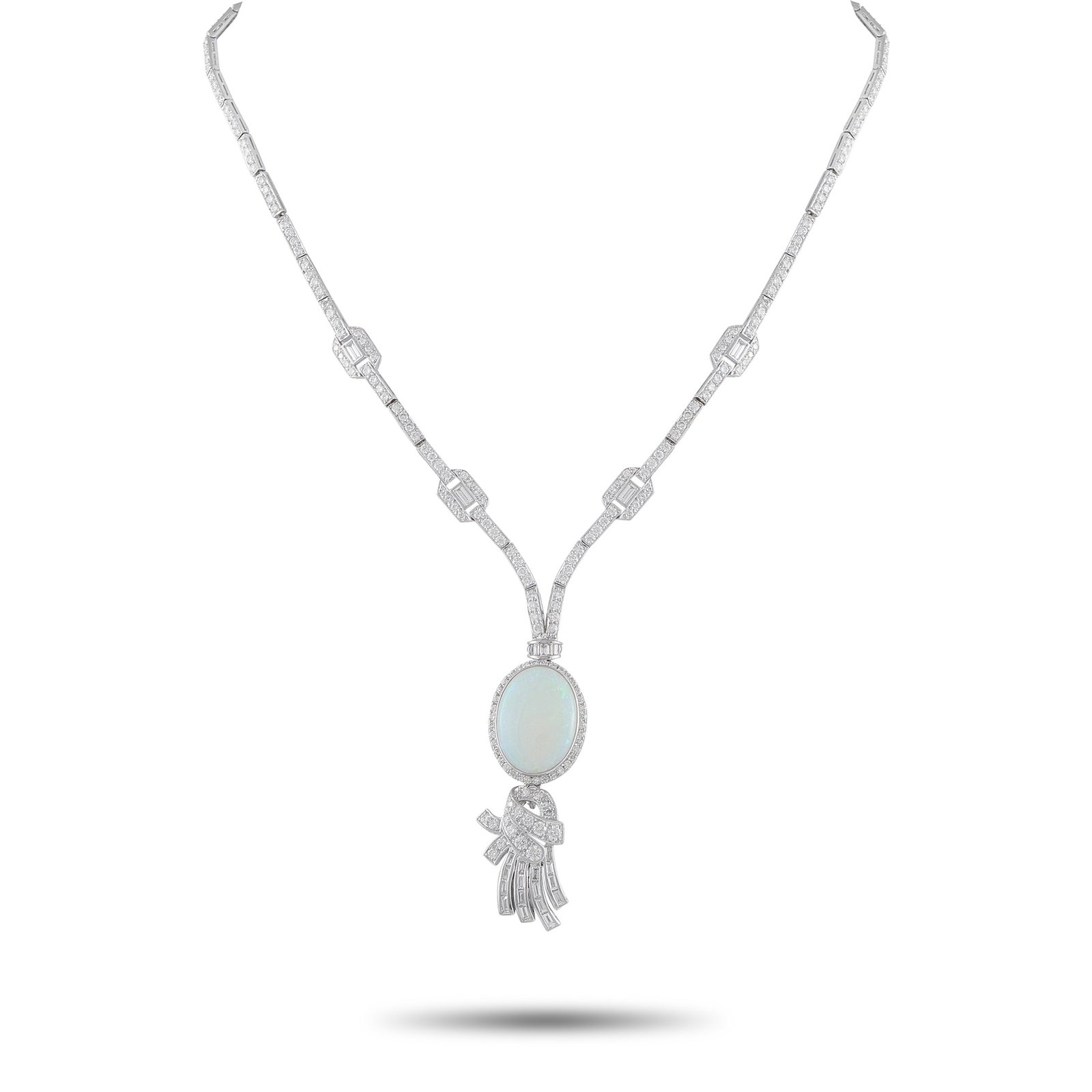 Platinum 5.60ct Diamond and Opal Necklace: This luxury necklace is an opulent piece that perfectly captures the elegance of the Art Deco era. A tassel motif and a captivating 9.70 carat Opal center stone add charm and sophistication to the ove