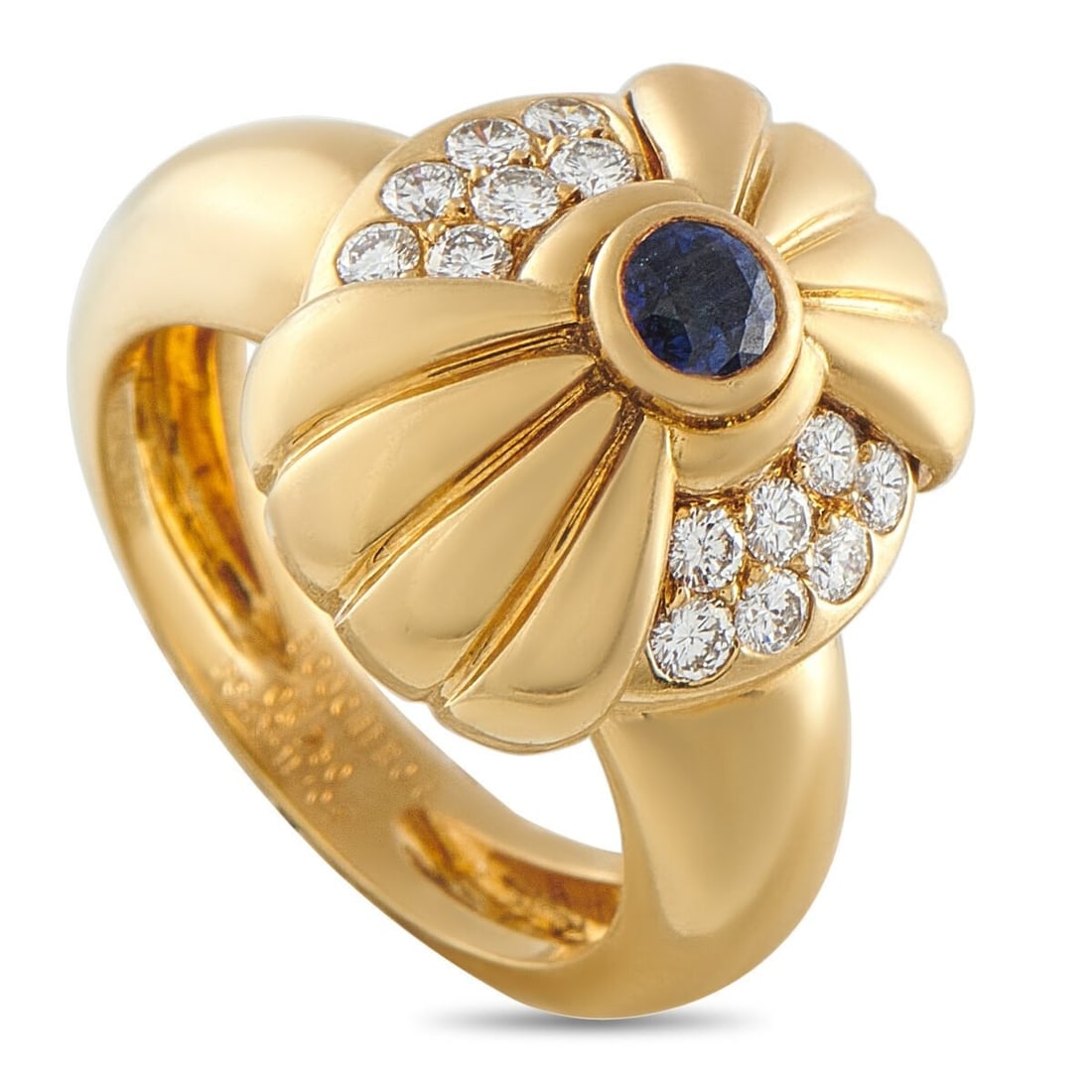 BOUCHERON 18K Yellow Gold 0.40ct Diamond and Sapphire Ring circa 1970: Simple and stylish, this Boucheron ring is a classic piece that will never go out of style. Inset Diamonds with a total weight of 0.40 carats make a statement on each side of the design and highlight 