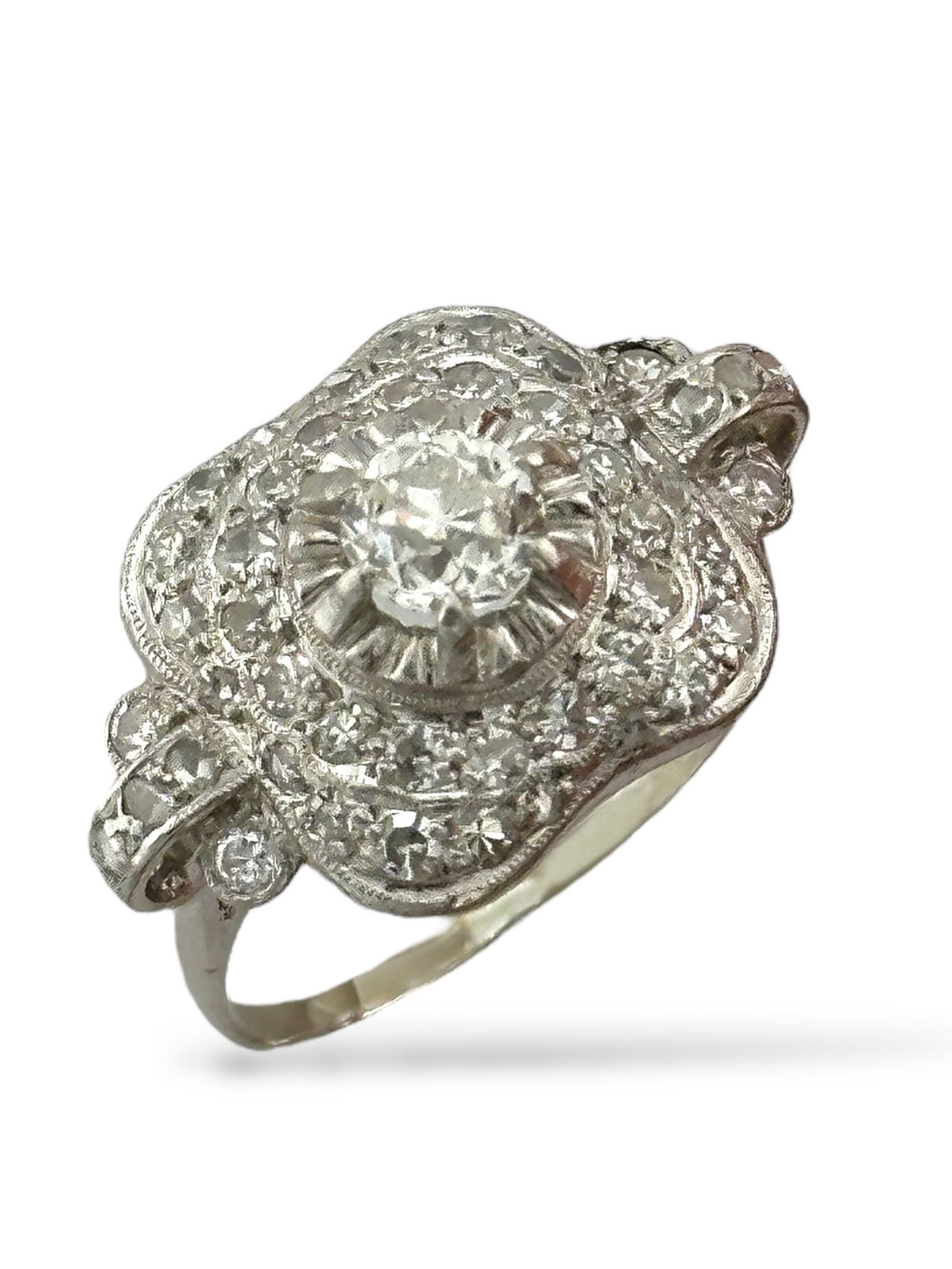 Ring Platinum, Art Deco Platinum Ring with 1.29 Carats of Diamonds Including a 0.60-Carat Center: This exquisite Art Deco platinum ring showcases refined geometry and timeless elegance, highlighted by a sparkling 0.60-carat natural round diamond at its center. Surrounded by a constellation of 46 a